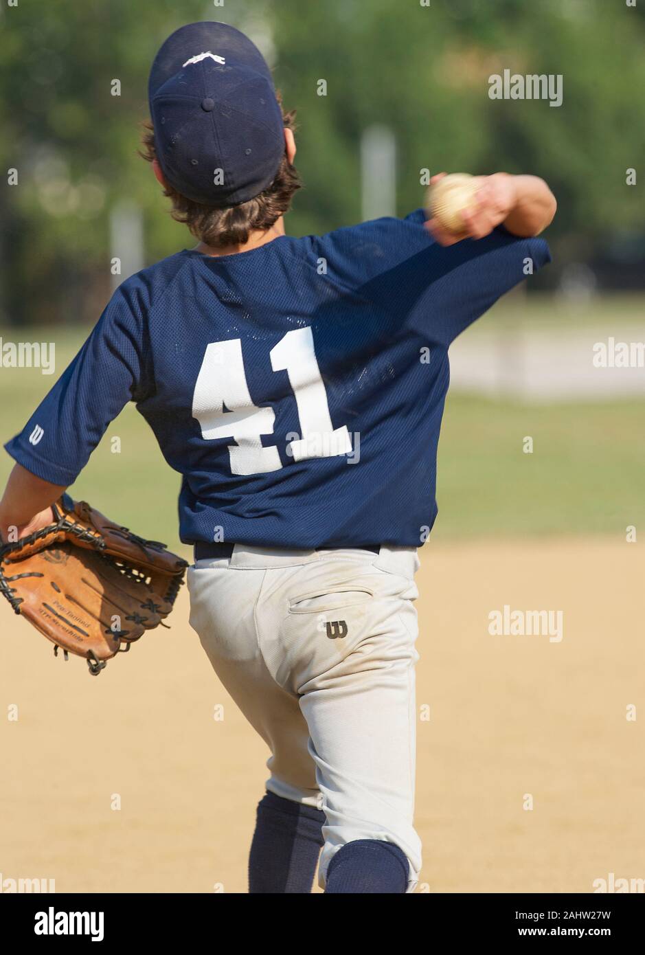 Catholic Middle School Baseball Game.Player throwing baseball Stock ...