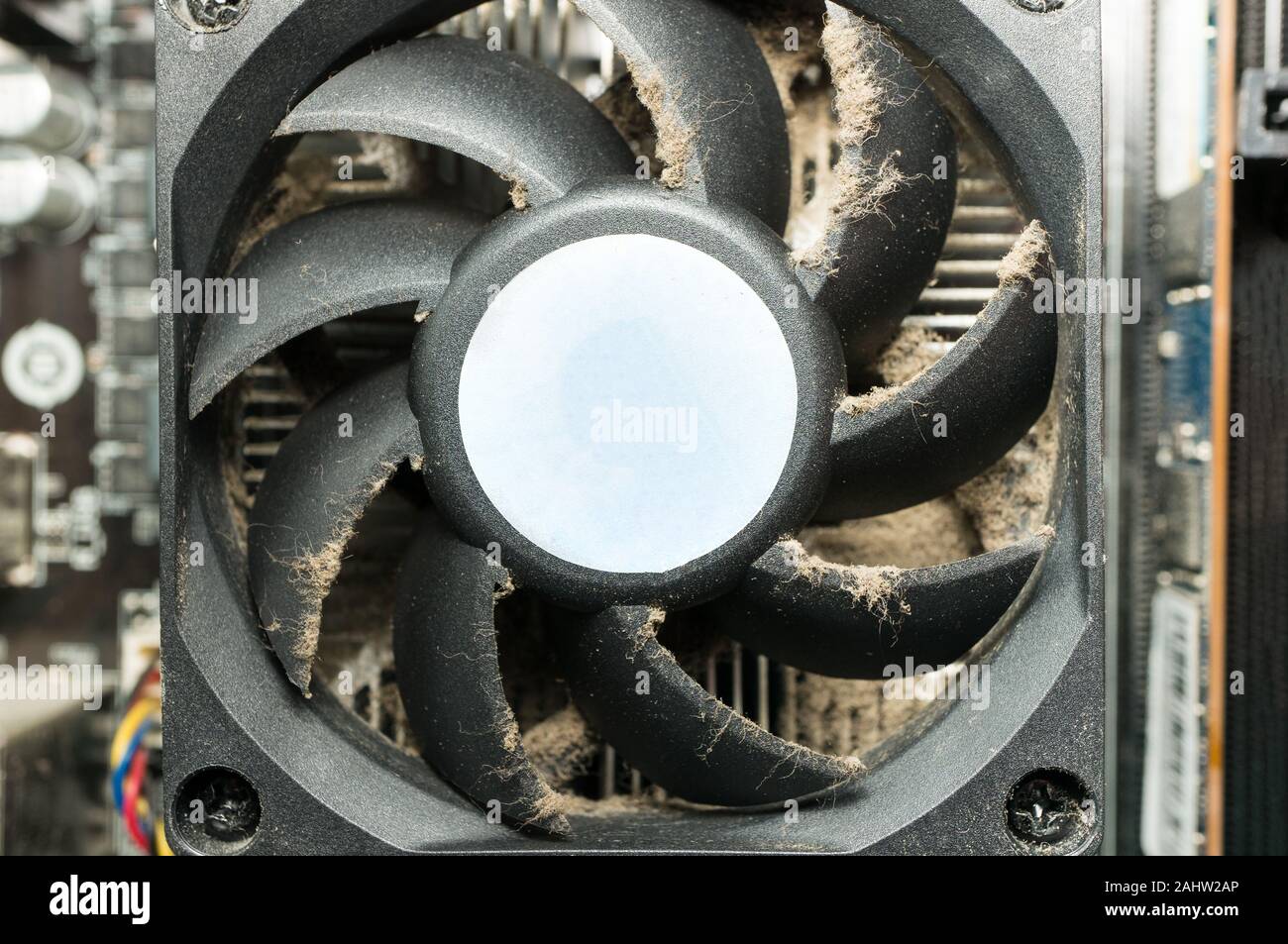 Desktop computer, fan in the dust closeup. Damage to the cooling system Stock Photo Alamy