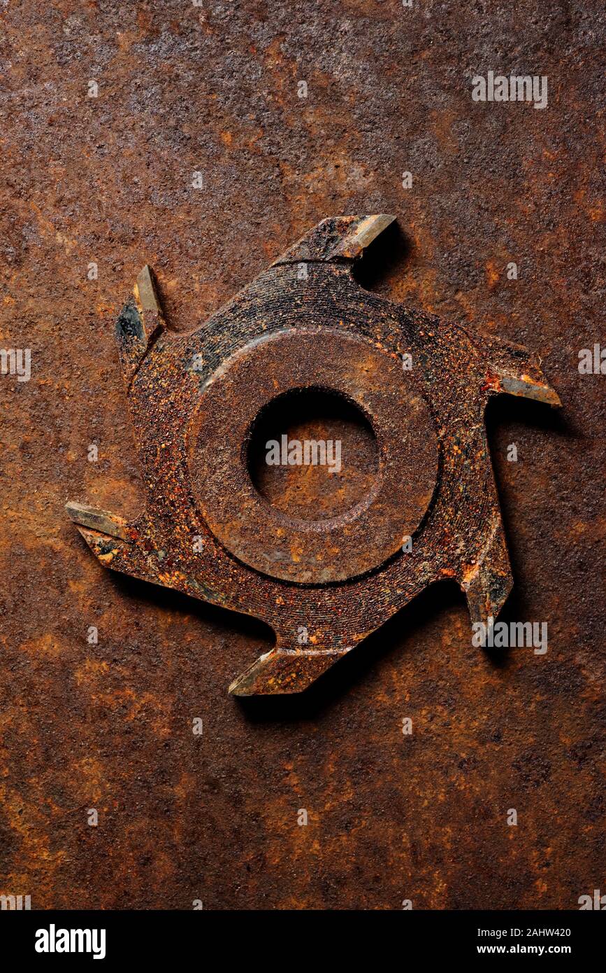 Backgrounds and textures: very old rusty milling cutter, industrial abstract Stock Photo