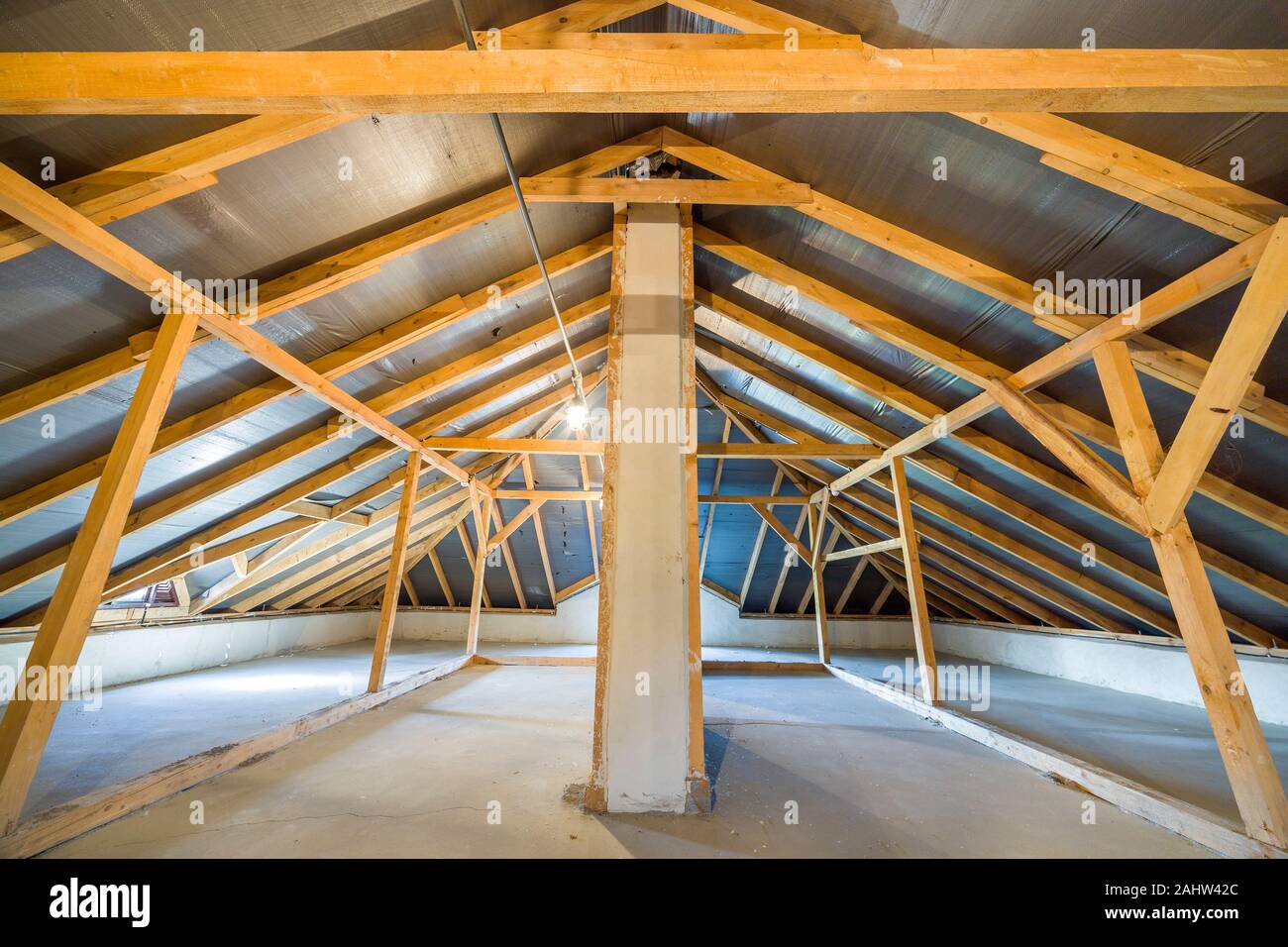Attic of a building with wooden beams of a roof structure Stock Photo ...