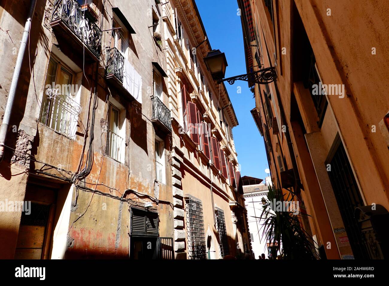 Old apartment buildings on the tiny Via della Reginella, in ancient