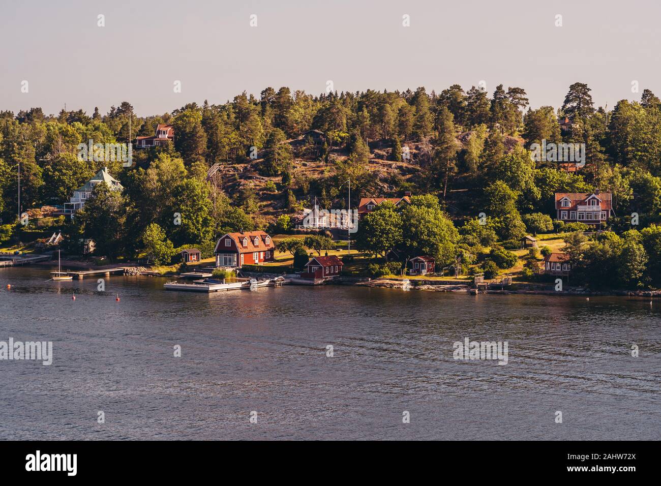 Small cottages in the Stockholm archipelago with piers for their small
