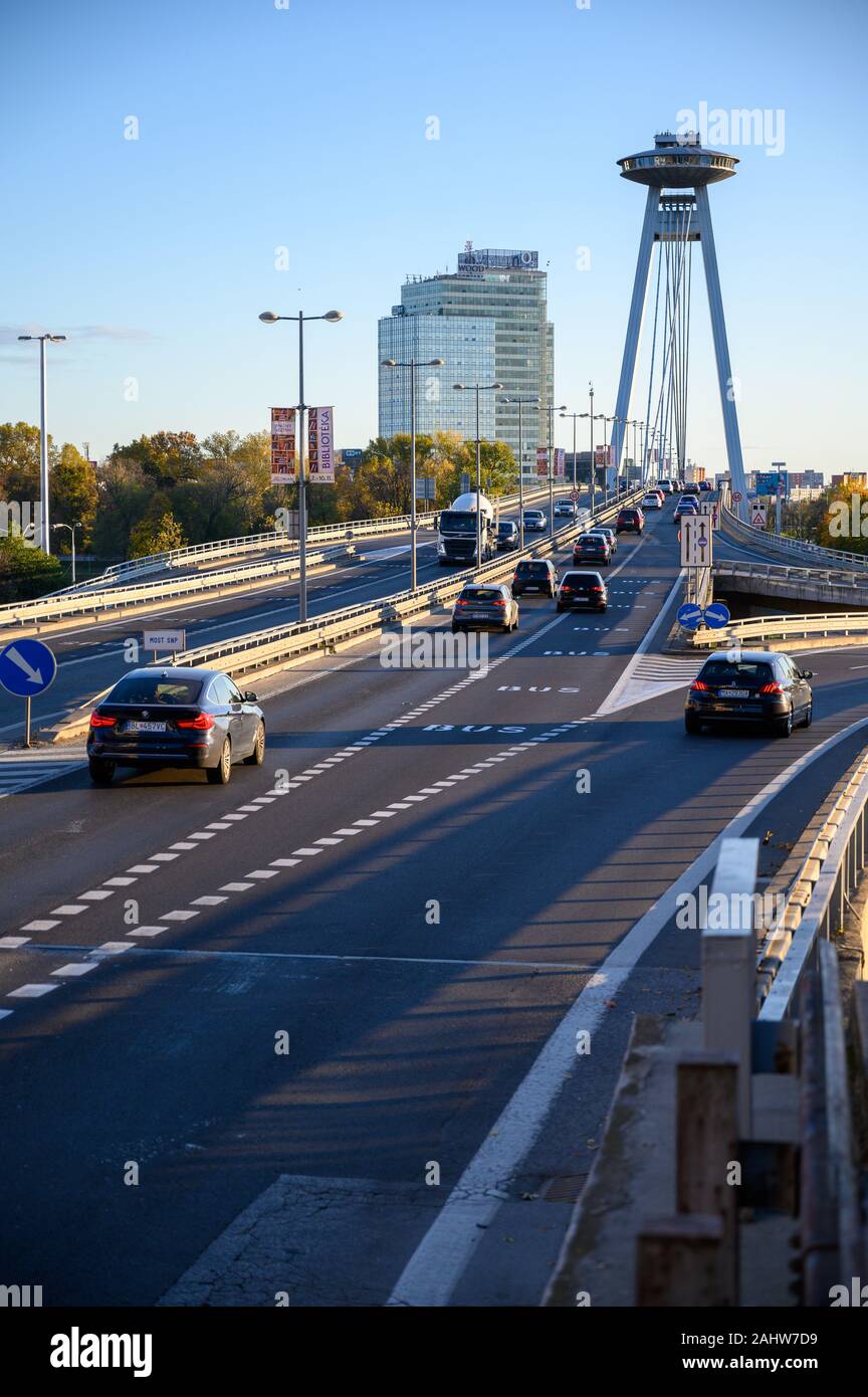 The SNP bridge spanning the river Danube in Bratislava. SNP is a Slovak abbreviation for Slovak National Uprising. Stock Photo