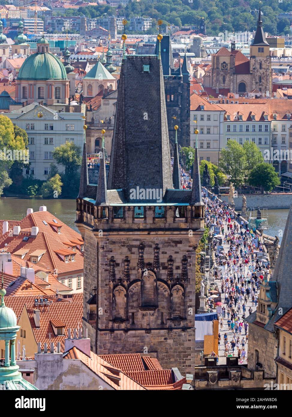 PRAGUE, CZECH REPUBLIC - SEPTEMBER 4: Tourists at the Charles Bridge in Prague, Czech Republic on September 4. Foto taken from Mala Strana with view t Stock Photo