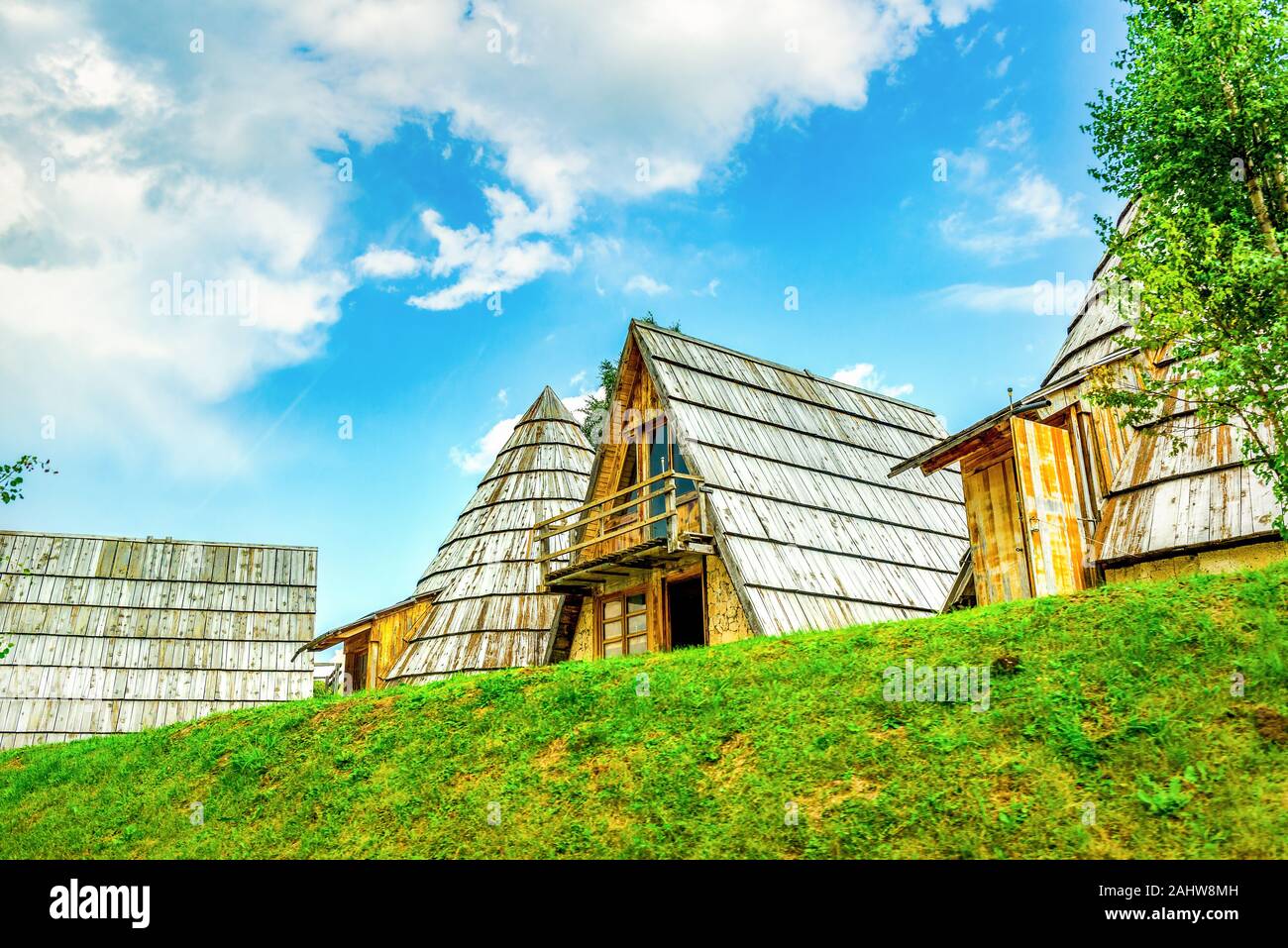 Pointed roofs of mountain cottages Stock Photo