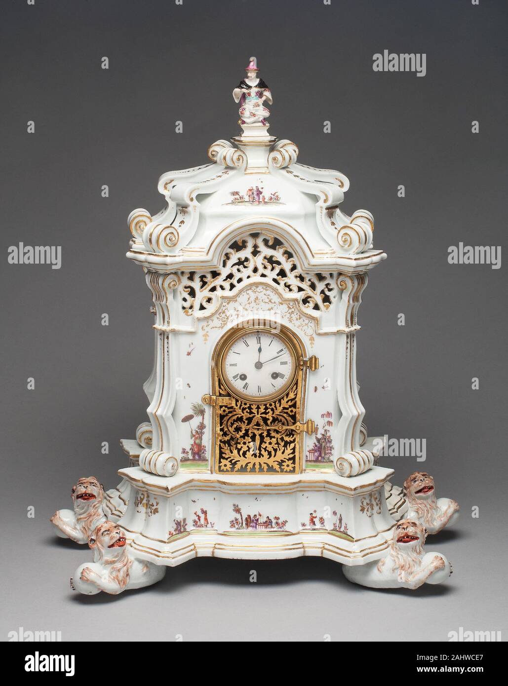 Meissen Porcelain Manufactory (Manufacturer). Clock. 1727–1730. Meissen. Hard-paste porcelain, polychrome enamels, and gilding This rare, monumental clock resembles German case clocks of the period that incorporated Baroque architectural motifs. The chinioserie decoration is rendered in the manner of Johann Gregorius Höroldt, who was the chief painter at Meissen and largely responsible for the early success of the factory. Stock Photo