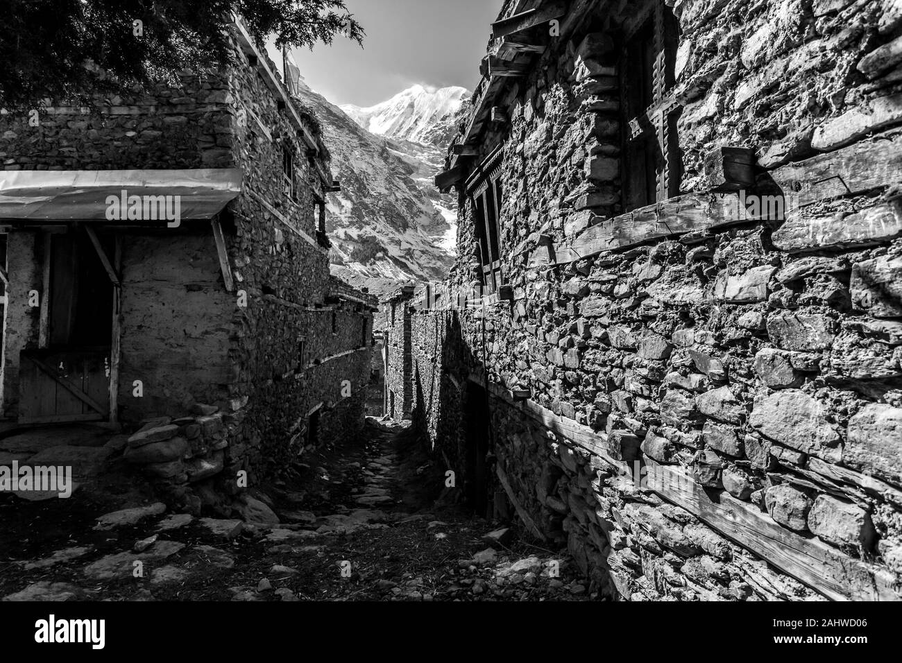 Street in small mountain village Manang in Nepal, Himalaya, Annapurna Conservation Area Stock Photo