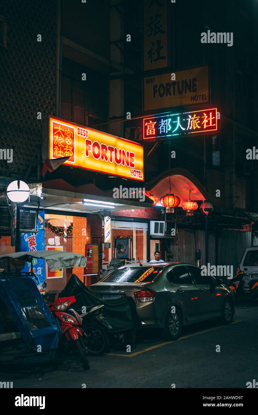 Night street scene in Binondo, Manila, The Philippines Stock Photo - Alamy