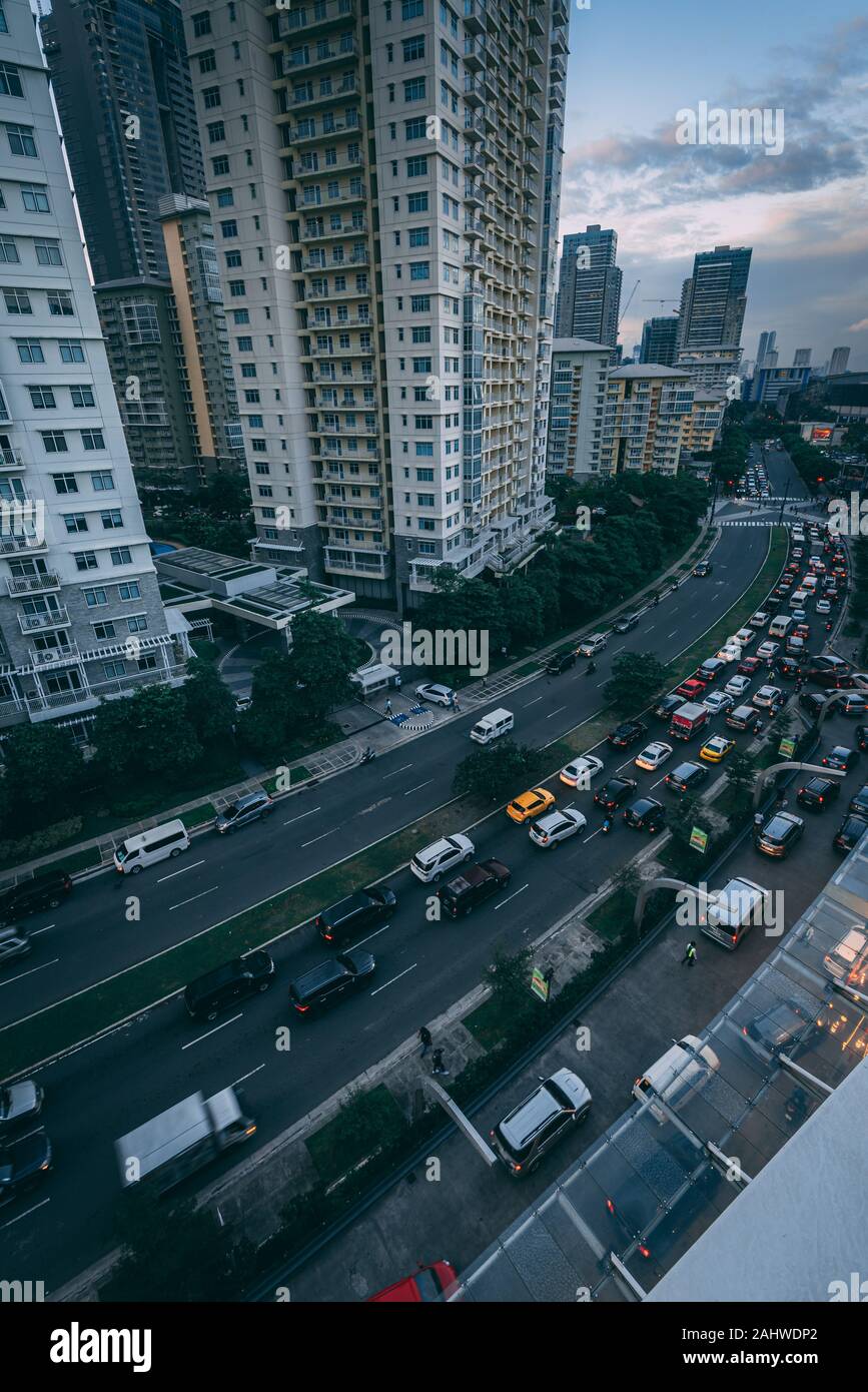 View of traffic on McKinley Parkway from SM Aura Premier, in Bonafacio Global City, Manila, Philippines Stock Photo