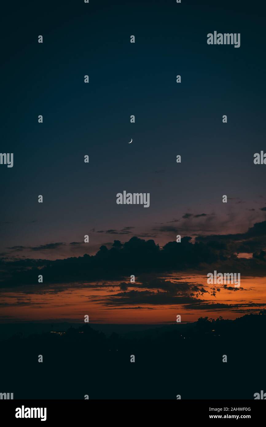 Crescent moon at sunset in Los Angeles Stock Photo - Alamy