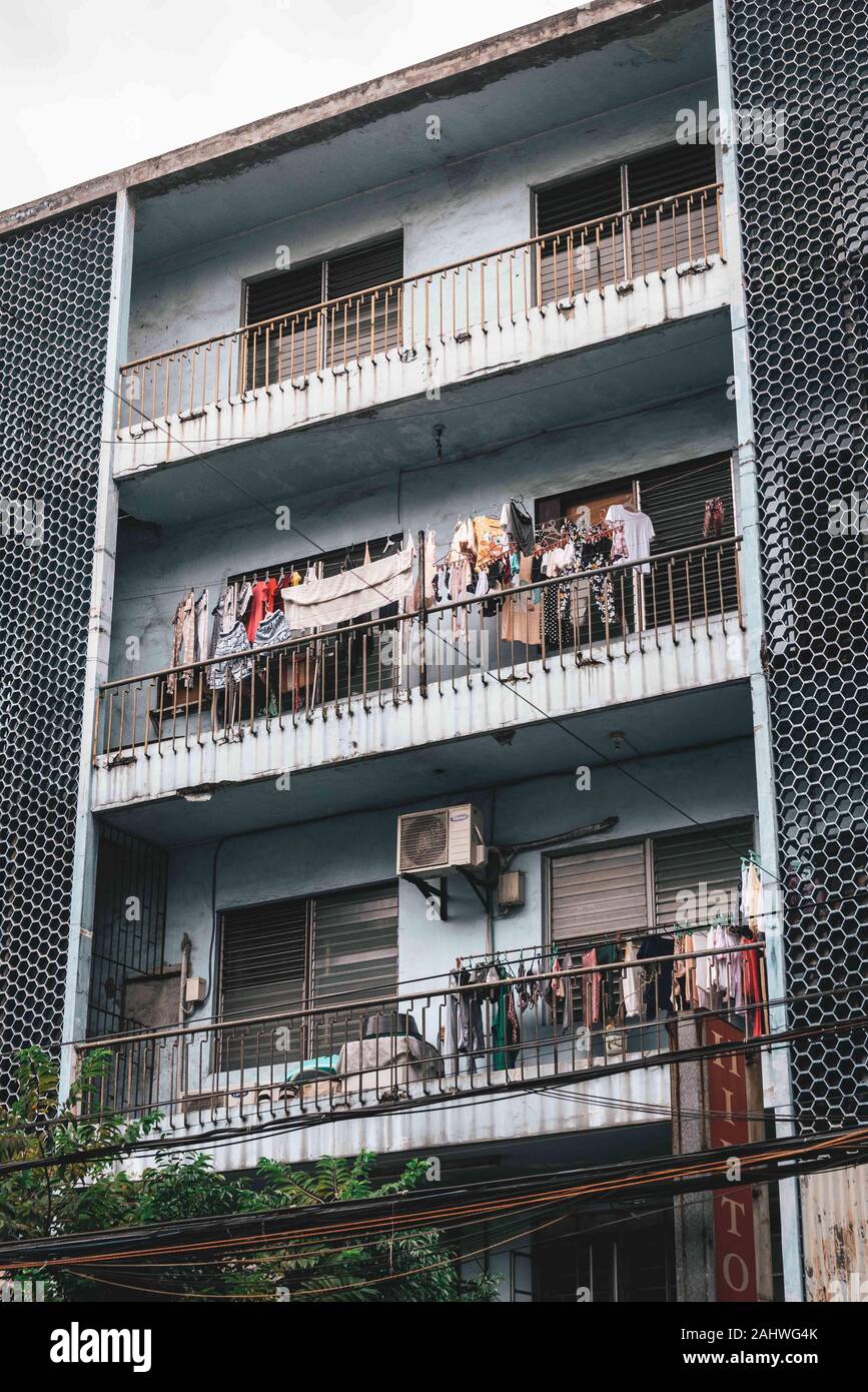 Laundry hanging on balconies in Binondo, Manila, The Philippines Stock