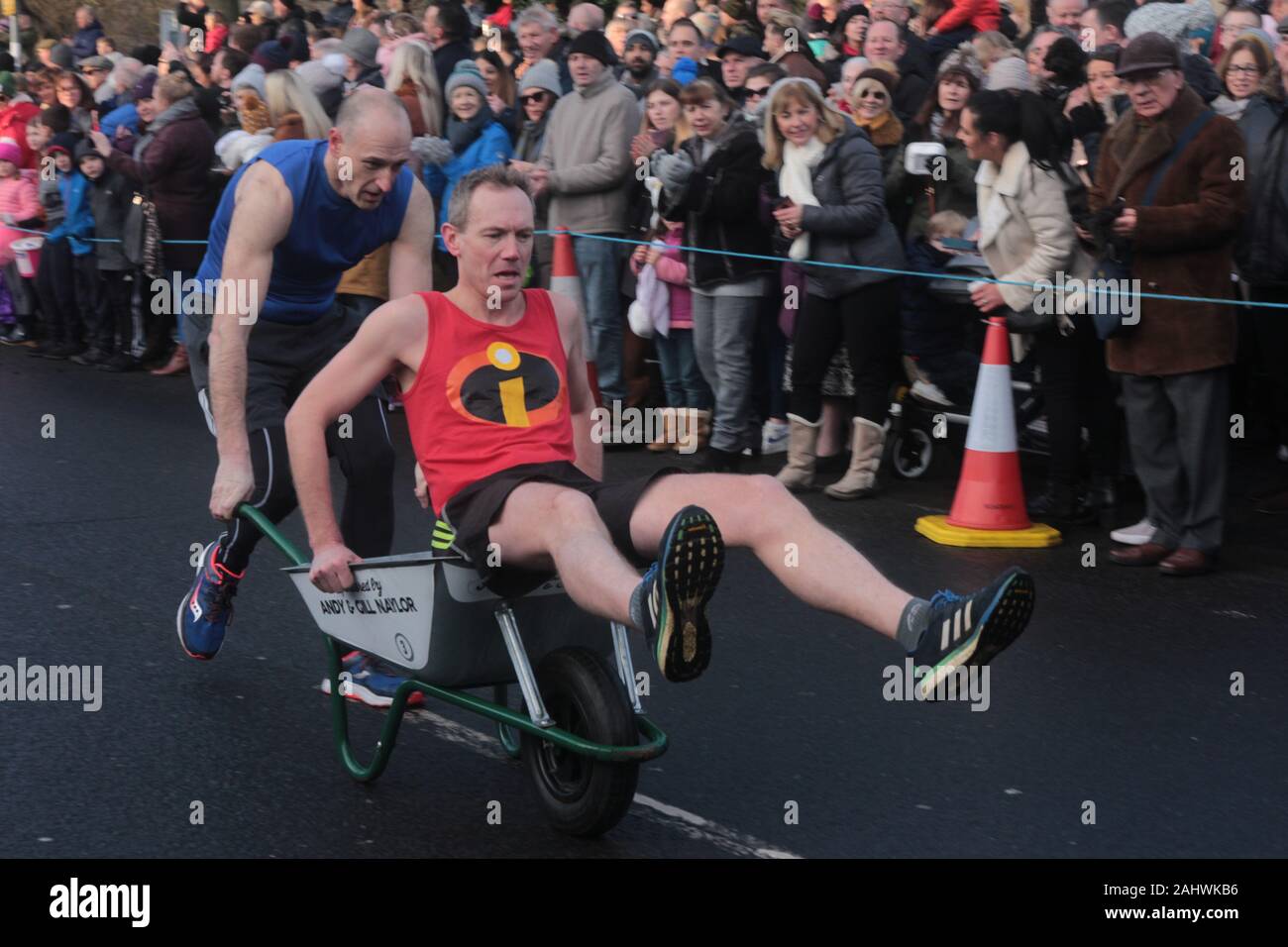Wheelbarrow race charity fundraising hi-res stock photography and ...