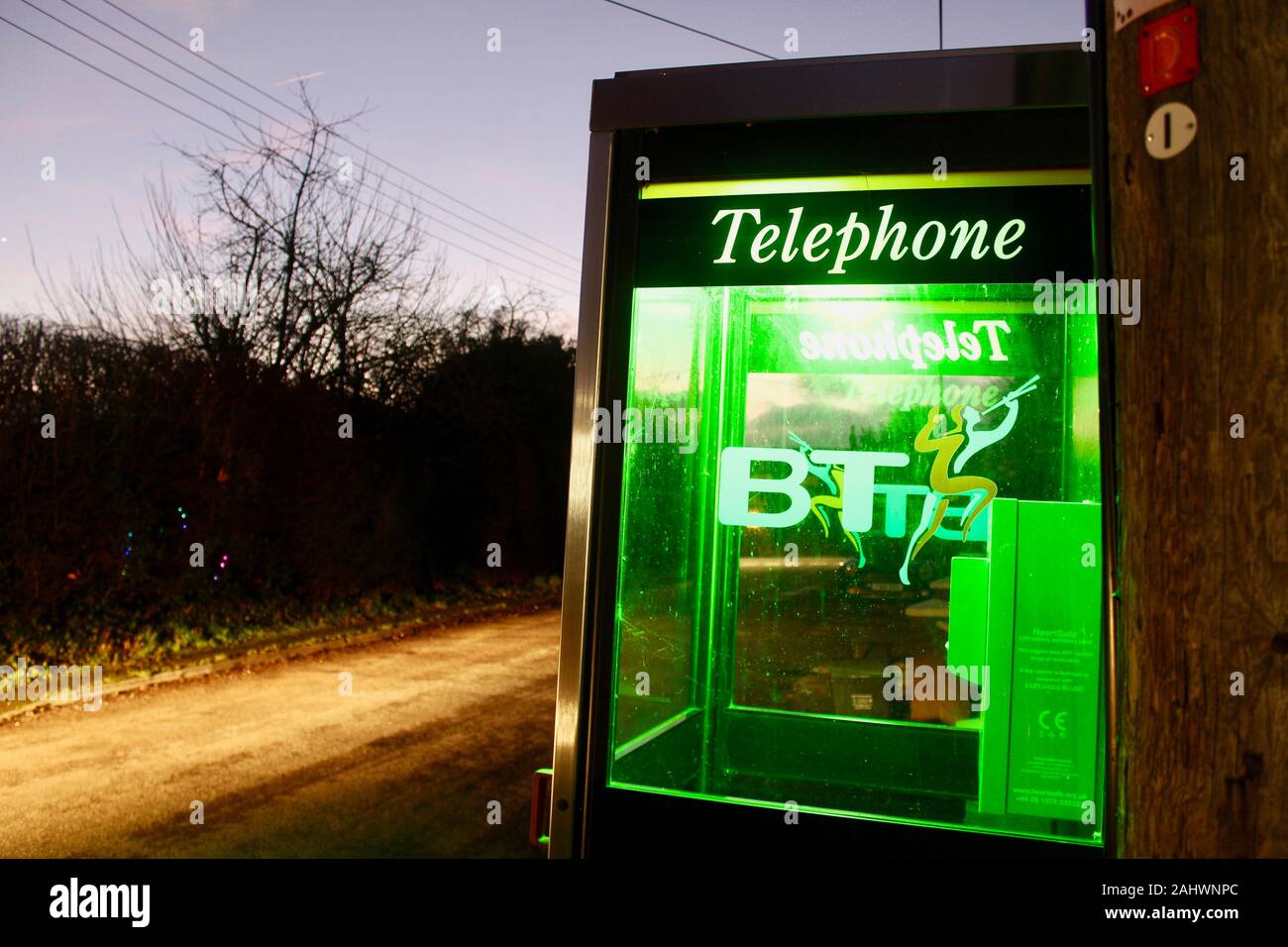 a phone box used to house a defibrillator in rural somerset england uk Stock Photo