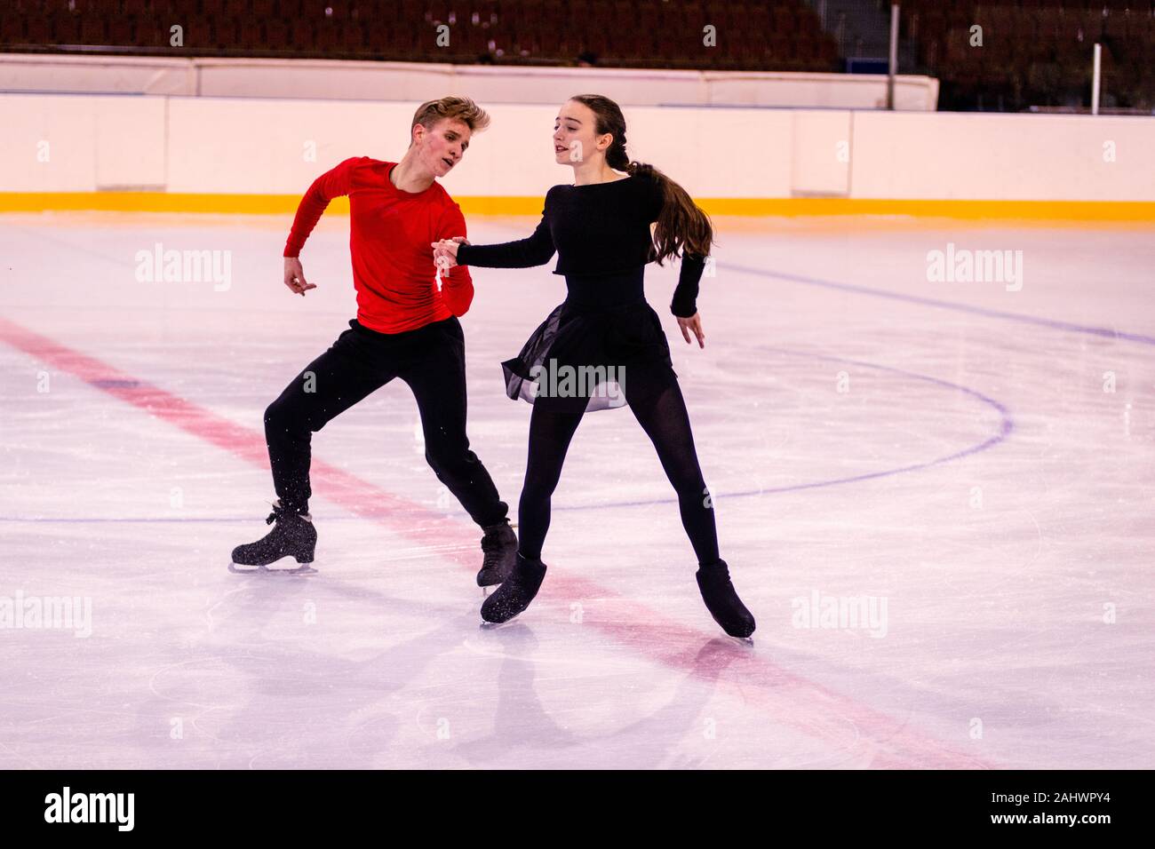 training of young athletes in figure skating. Partners perform dance