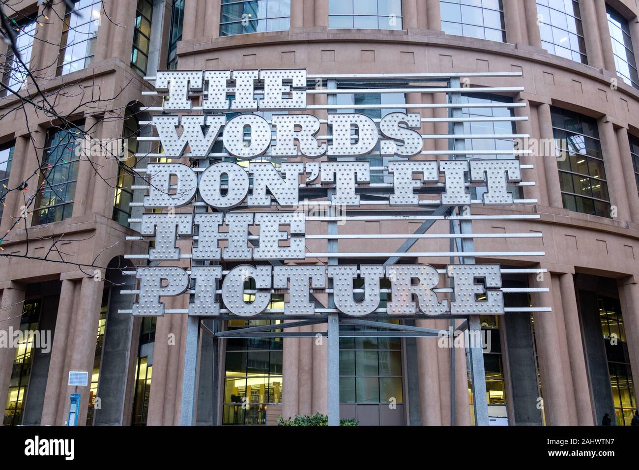 'The Words Don't Fit the Picture' display outside Vancouver Public Library, Vancouver, British Columbia, Canada Stock Photo