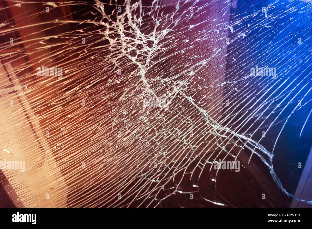 Broken glass front door windows of a main residential house. Made with