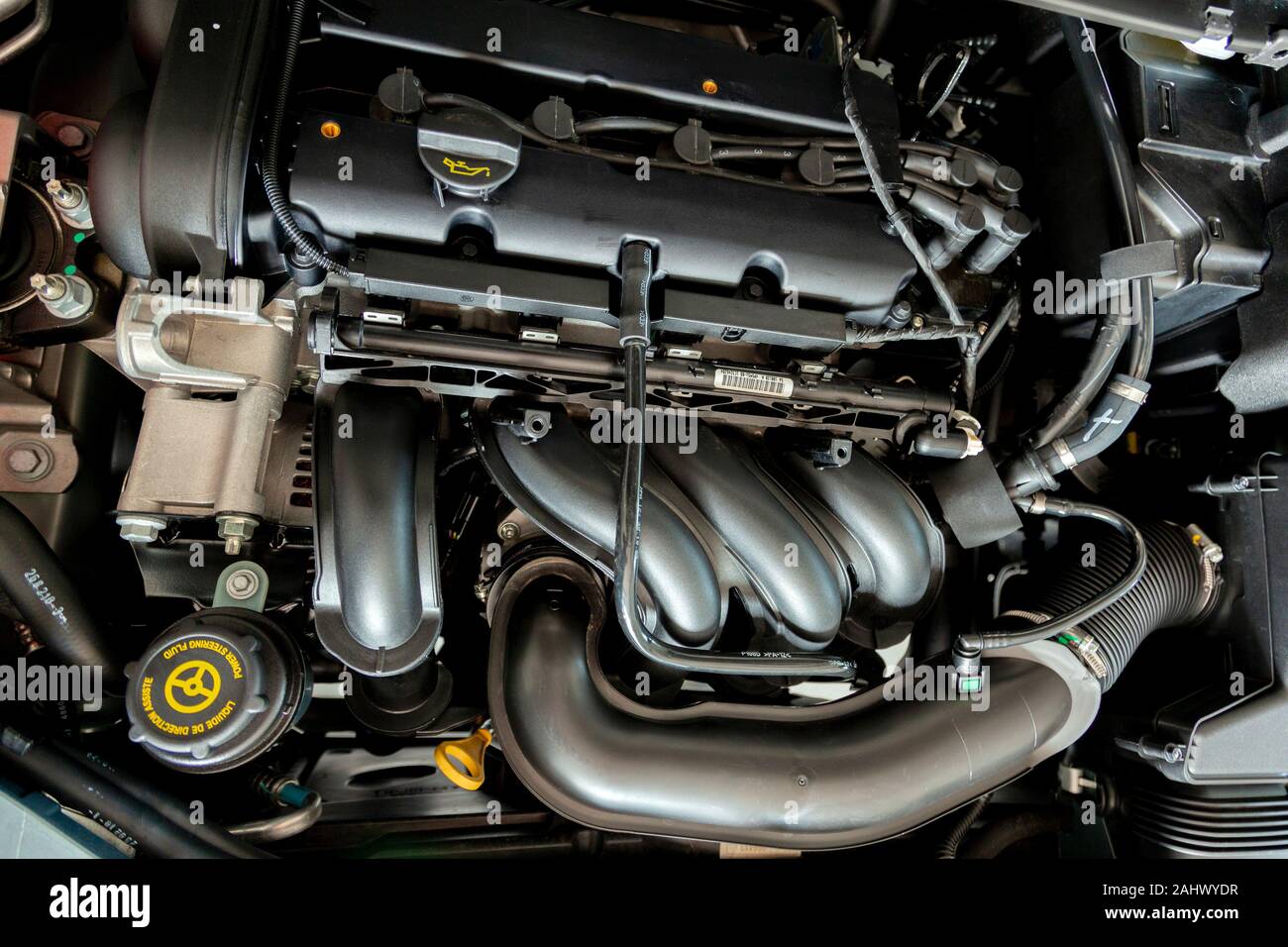 New car engine. Car hood open. Automotive industry Stock Photo - Alamy