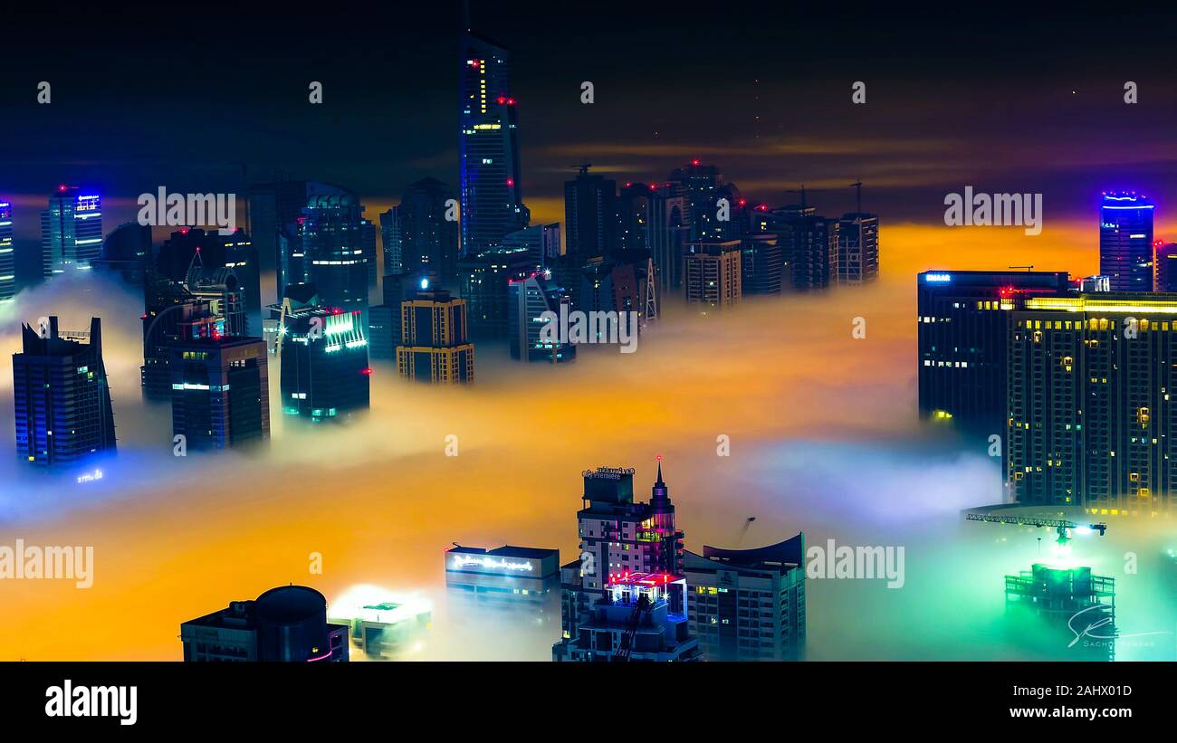 Dubai cityscape at night in winter. Stock Photo
