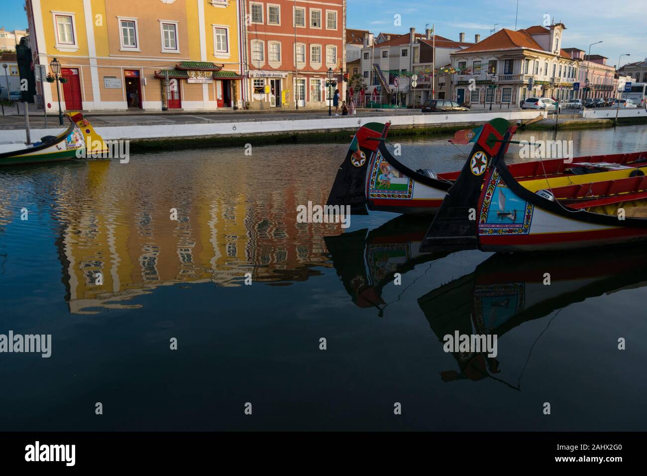 Moliceiro boats moored on the central canal in Aveiro Portugal Stock Photo
