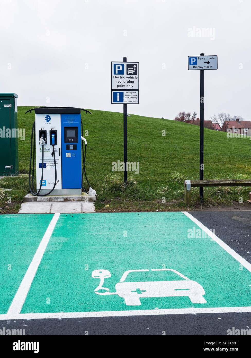 Electric vehicle charging points and bay at Tynemouth, UK Stock Photo