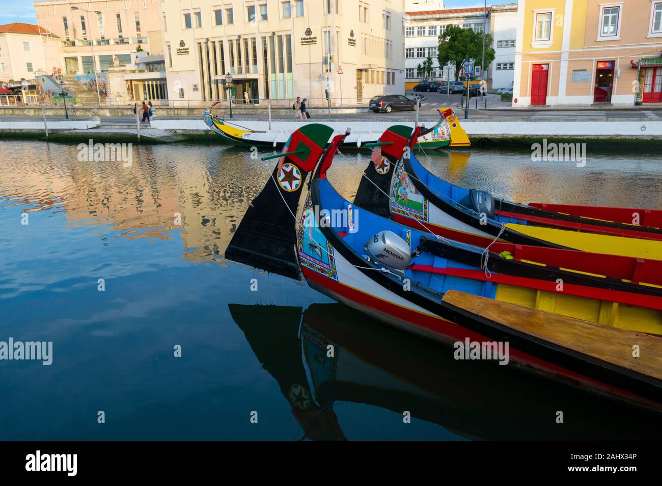 Moliceiro boats moored on the central canal in Aveiro Portugal Stock Photo