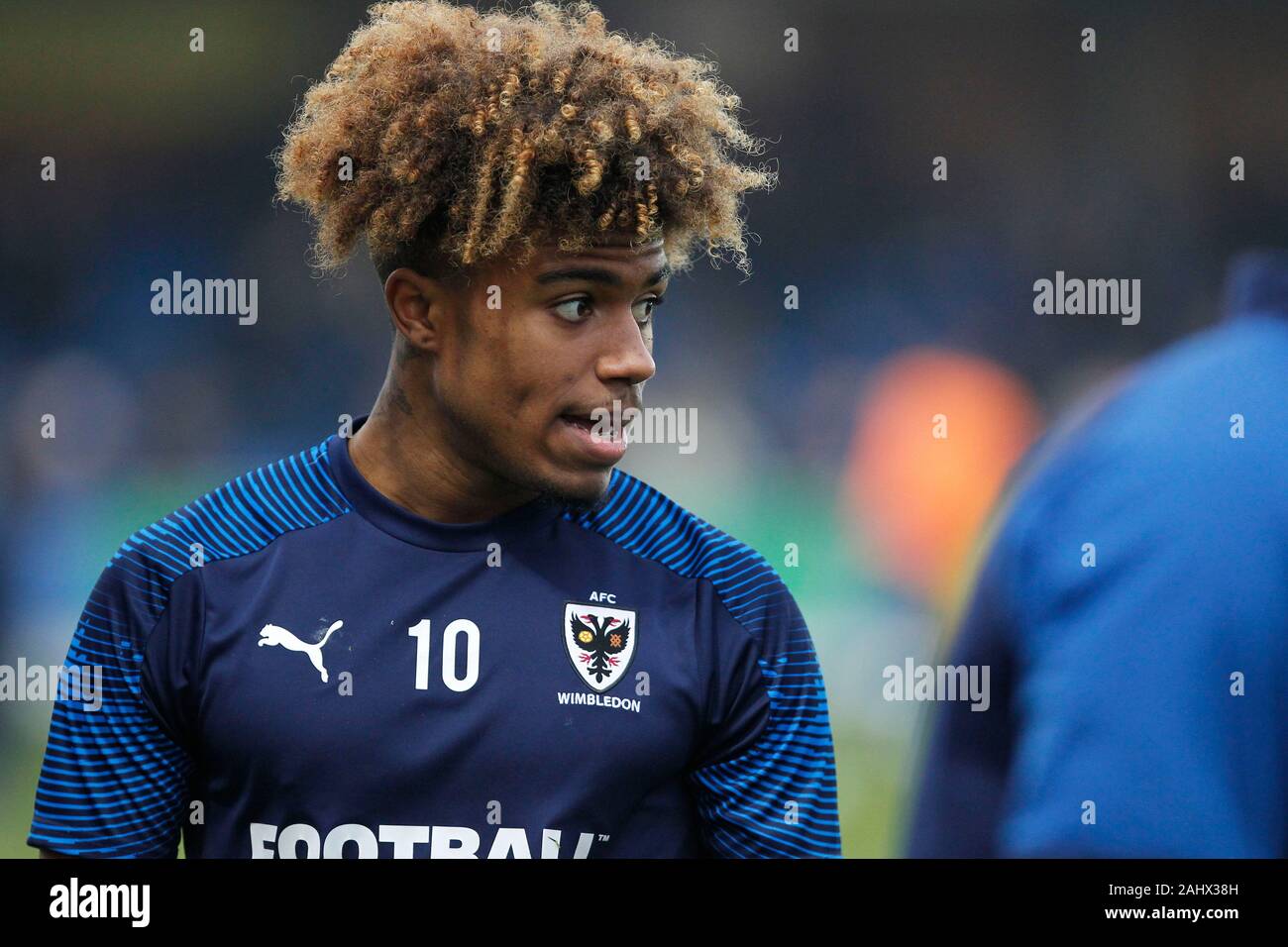 Kingston, UK. 01st Jan, 2020. Ossama Ashley of AFC Wimbledon warming up  during the EFL Sky Bet League 1 match between AFC Wimbledon and Southend  United at the Cherry Red Records Stadium,