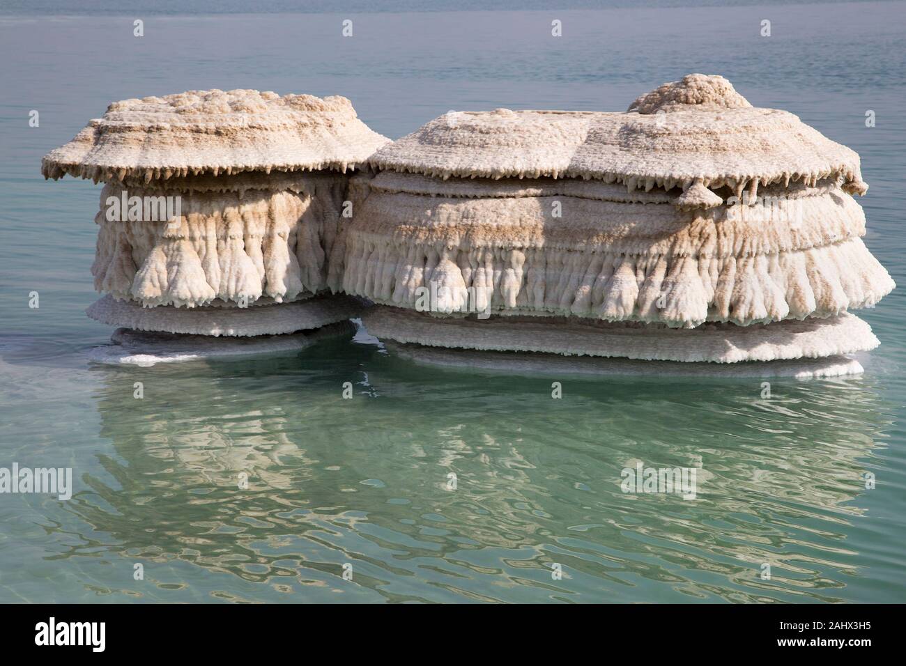 Salt chimneys form where fresh water flows into the Dead Sea and are exposed as water levels drop. Stock Photo