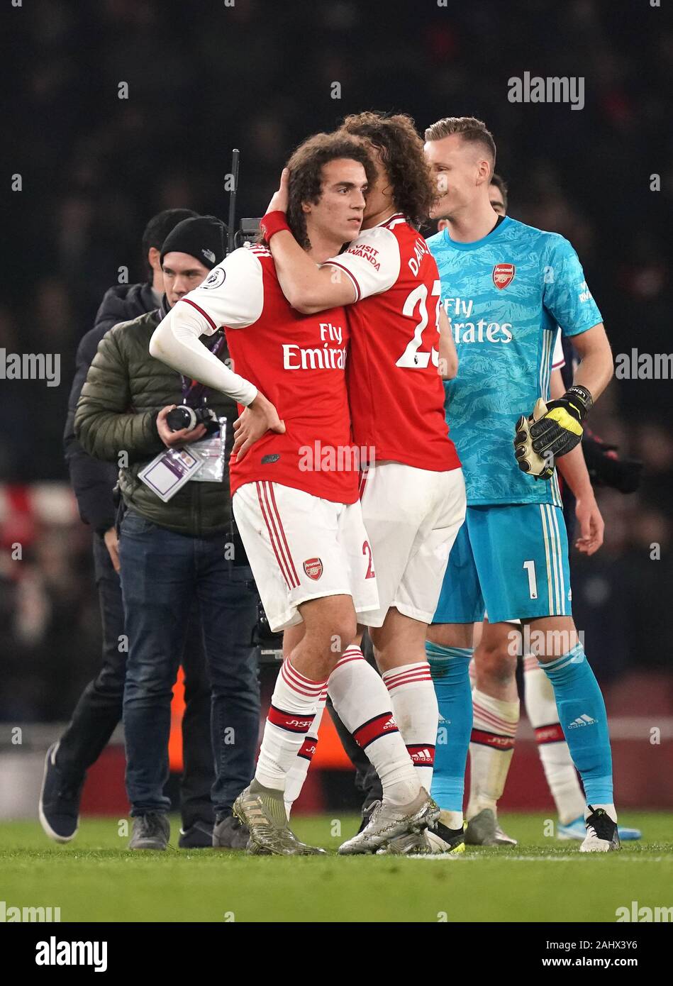 Arsenal's Matteo Guendouzi (left) and Arsenal's David Luiz react after the  final whistle during the Premier League match at the Emirates Stadium,  London Stock Photo - Alamy