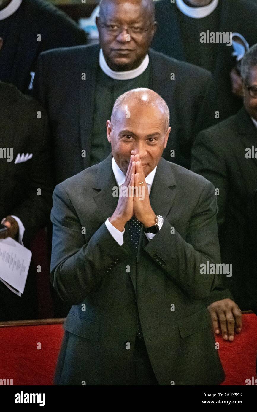Charleston, United States. 01 January, 2020. Democratic presidential hopeful Gov. Deval Patrick of Massachusetts, center, joins in the worship service at the historic Mother Emanuel AME Church January 1, 2020 in Charleston, South Carolina. The service celebrated Emancipation Day, marking the abolition of slavery in the United States.  Credit: Richard Ellis/Alamy Live News Stock Photo