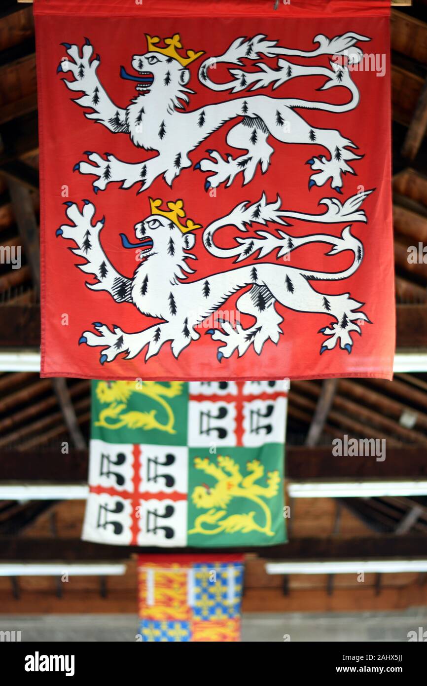Hay-on-Wye  UK Dec 24 2019 - Flags hanging from the ceiling of Hay Butter Market Stock Photo