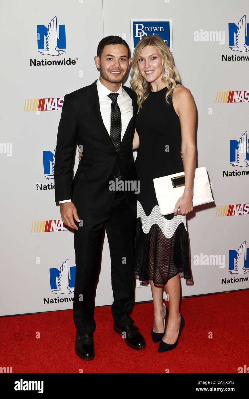 NEW YORK - SEPT 27: Kyle Larson (L) and wife Katelyn Sweet, attend the 2016 NASCAR Foundation Honors Gala at Marriott Marquis on September 27, 2016. Stock Photo