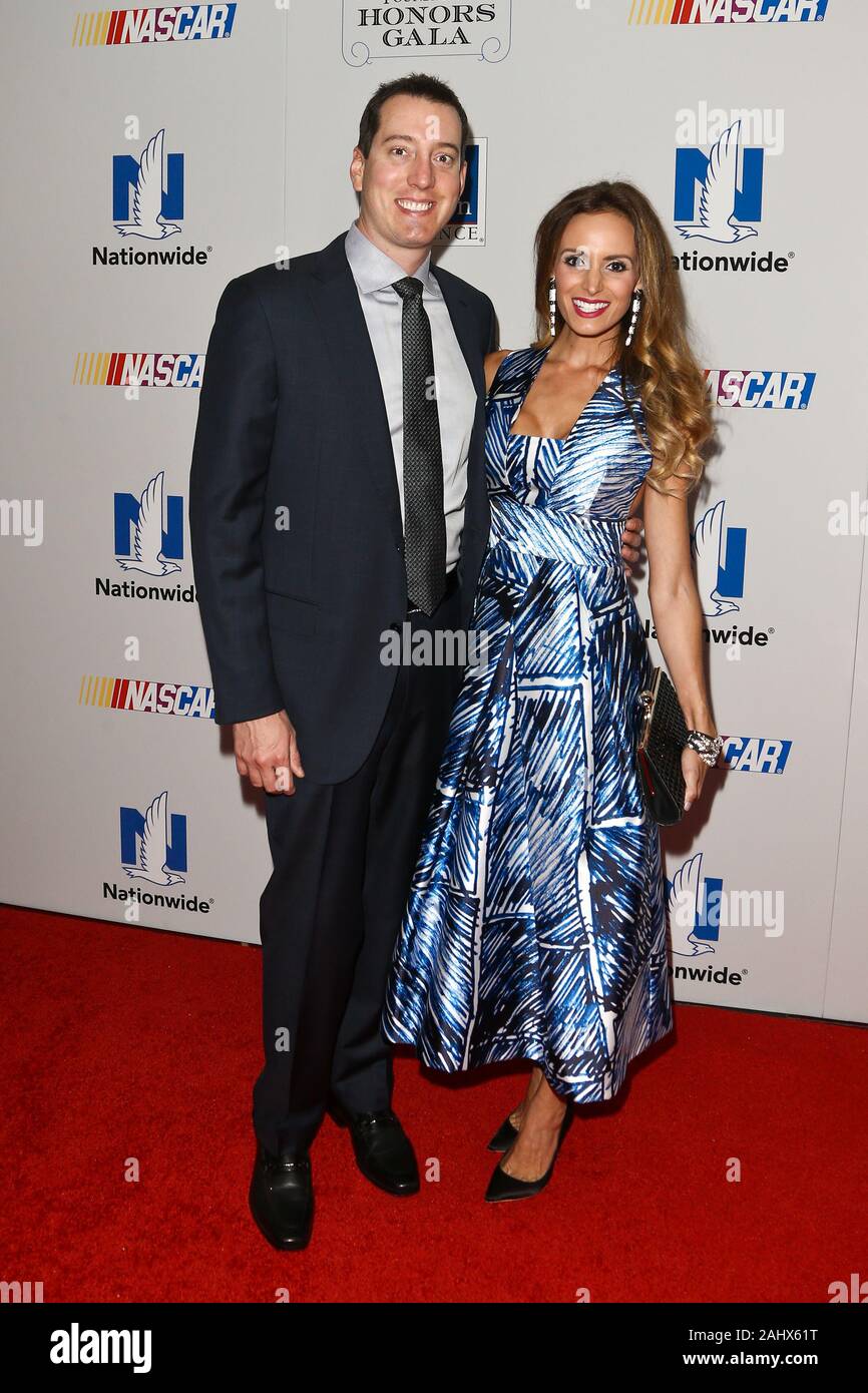 NEW YORK-SEPT 27: Kyle Busch (L) and wife Samantha attend the 2016 NASCAR Foundation Honors Gala at Marriott Marquis on September 27, 2016 in New York Stock Photo