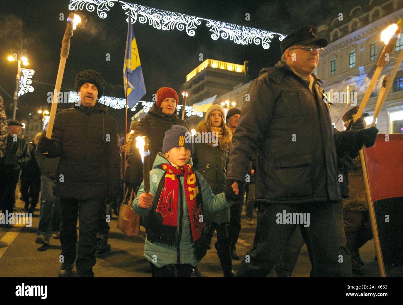 Kyiv, Ukraine. 1st Jan, 2020. Ukrainian activists carry torches during ...
