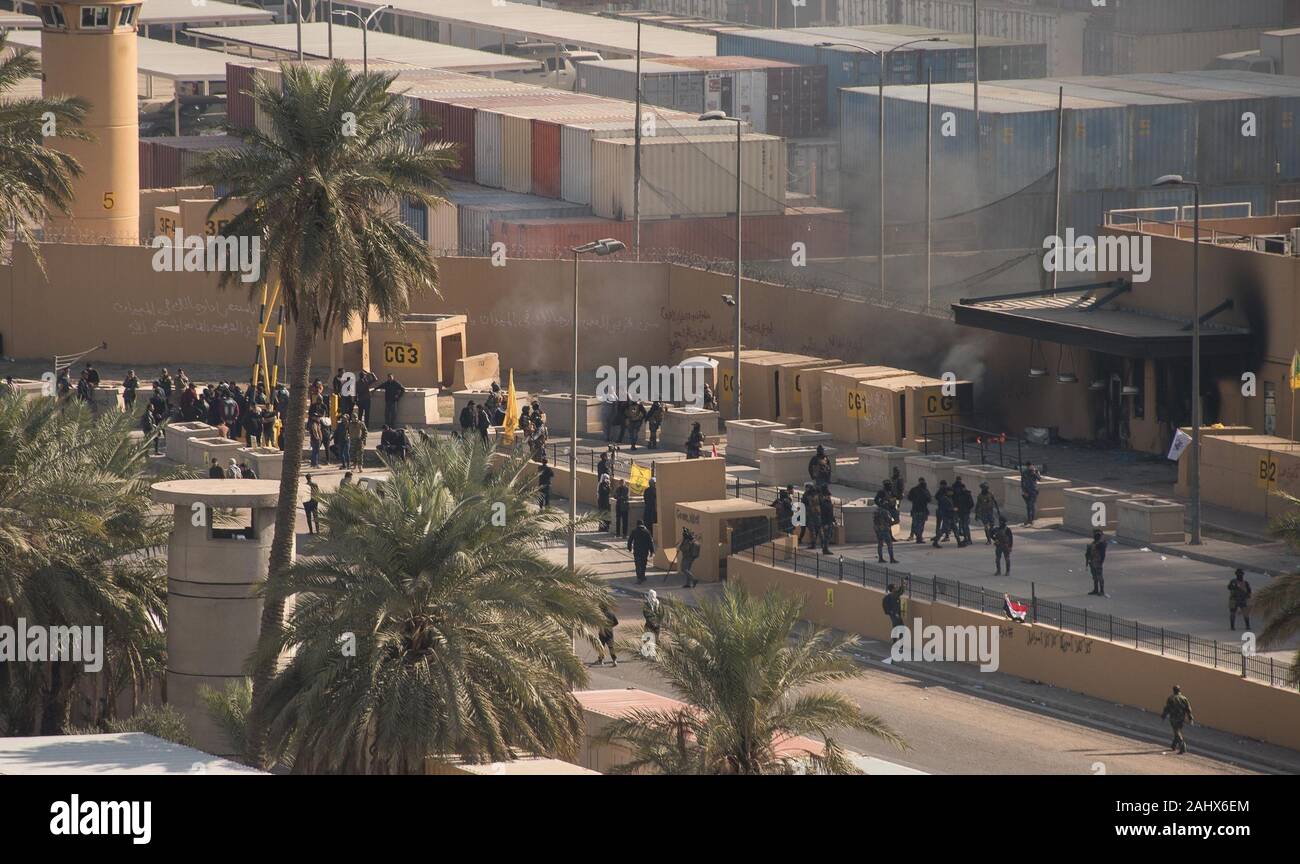 Baghdad, Iraq. 01st Jan, 2020. Crowds of assailants and attackers