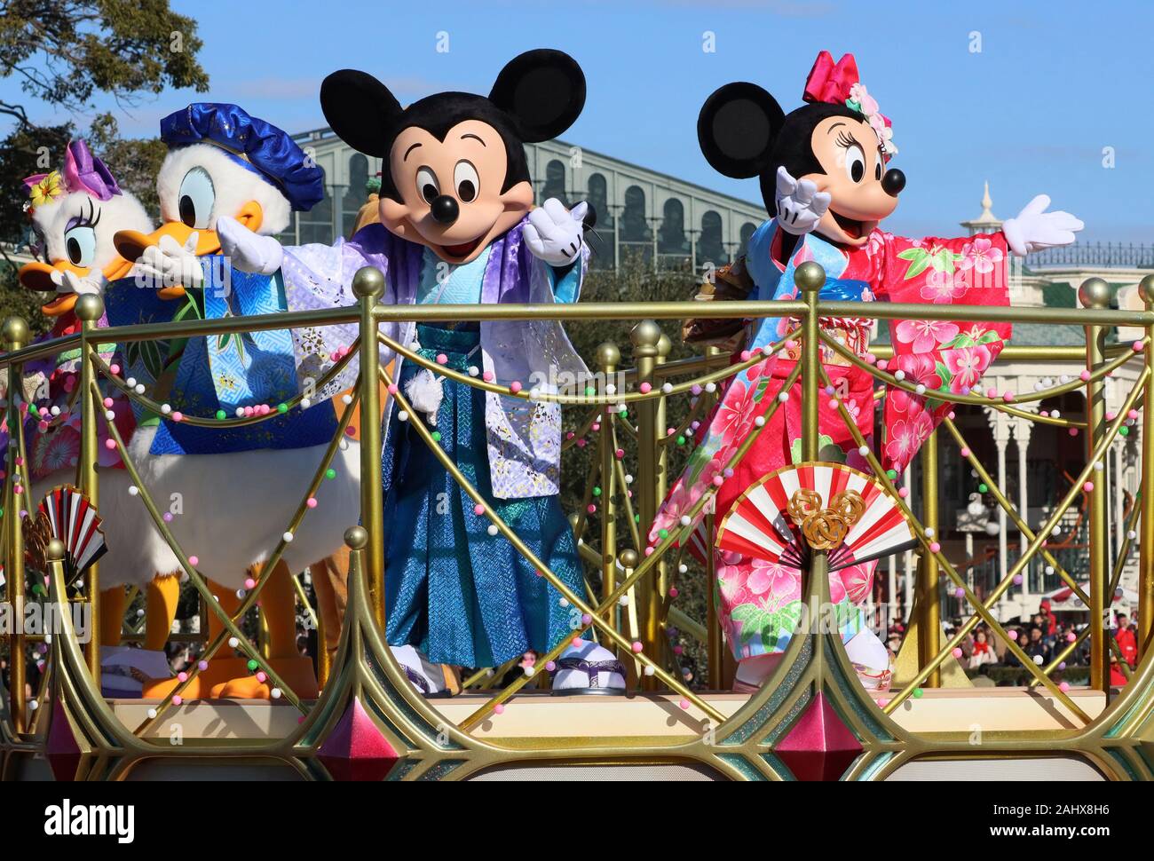 Urayasu, Japan. 1st Jan, 2020. Disney characters Mickey and Minnie Mouse in  traditional kimono dresses greet guests from a float during a New Year's  Day parade at the Tokyo Disneyland in Urayasu,