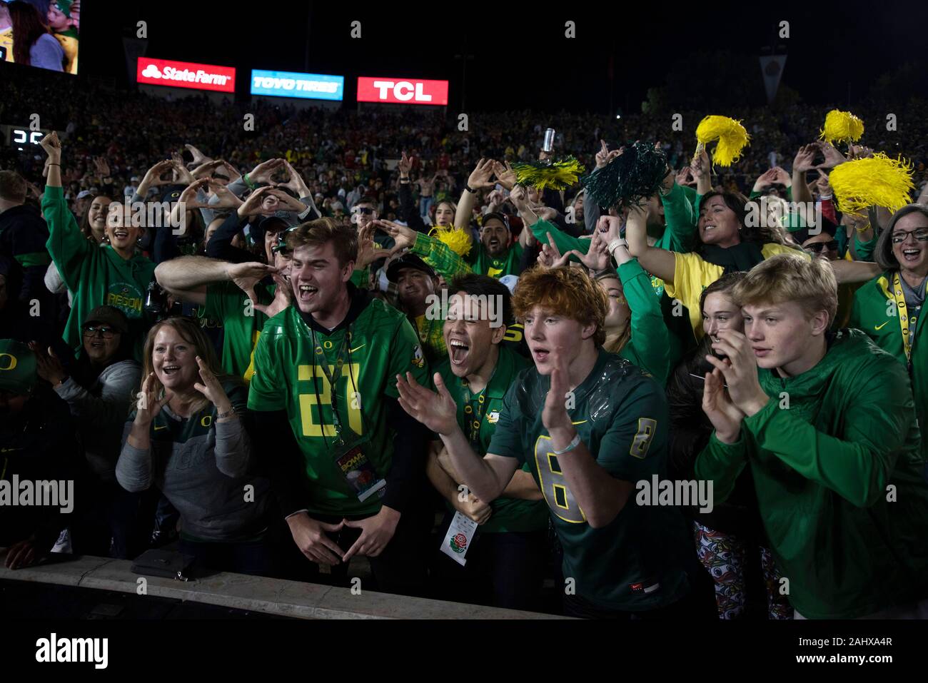 Pasadena, CA. 01st Jan, 2020. Oregon fans celebrate their victory during the 2019 Rose Bowl game between the Oregon Ducks and the Wisconsin Badgers at the Rose Bowl Stadium in Pasadena, CA. John Green/CSM/Alamy Live News Stock Photo