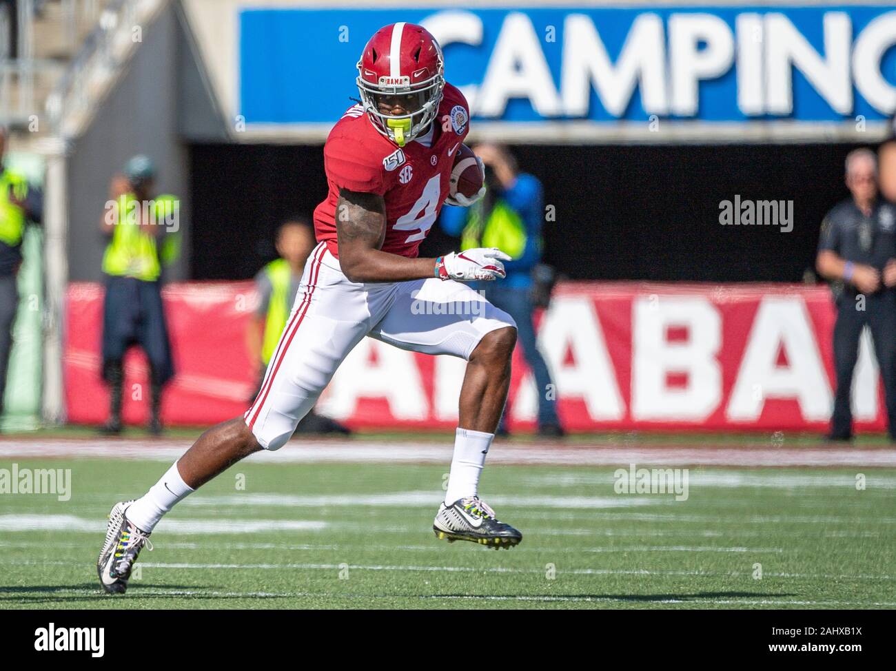 Orlando, FL, USA. 1st Jan, 2020. Alabama Crimson Tide wide receiver Jerry Jeudy (4) runs with the ball during the VRBO Citrus Bowl game between Alabama Crimson Tide and the Michigan Wolverines at Camping World Stadium in Orlando, Fl. Romeo T Guzman/CSM/Alamy Live News Stock Photo