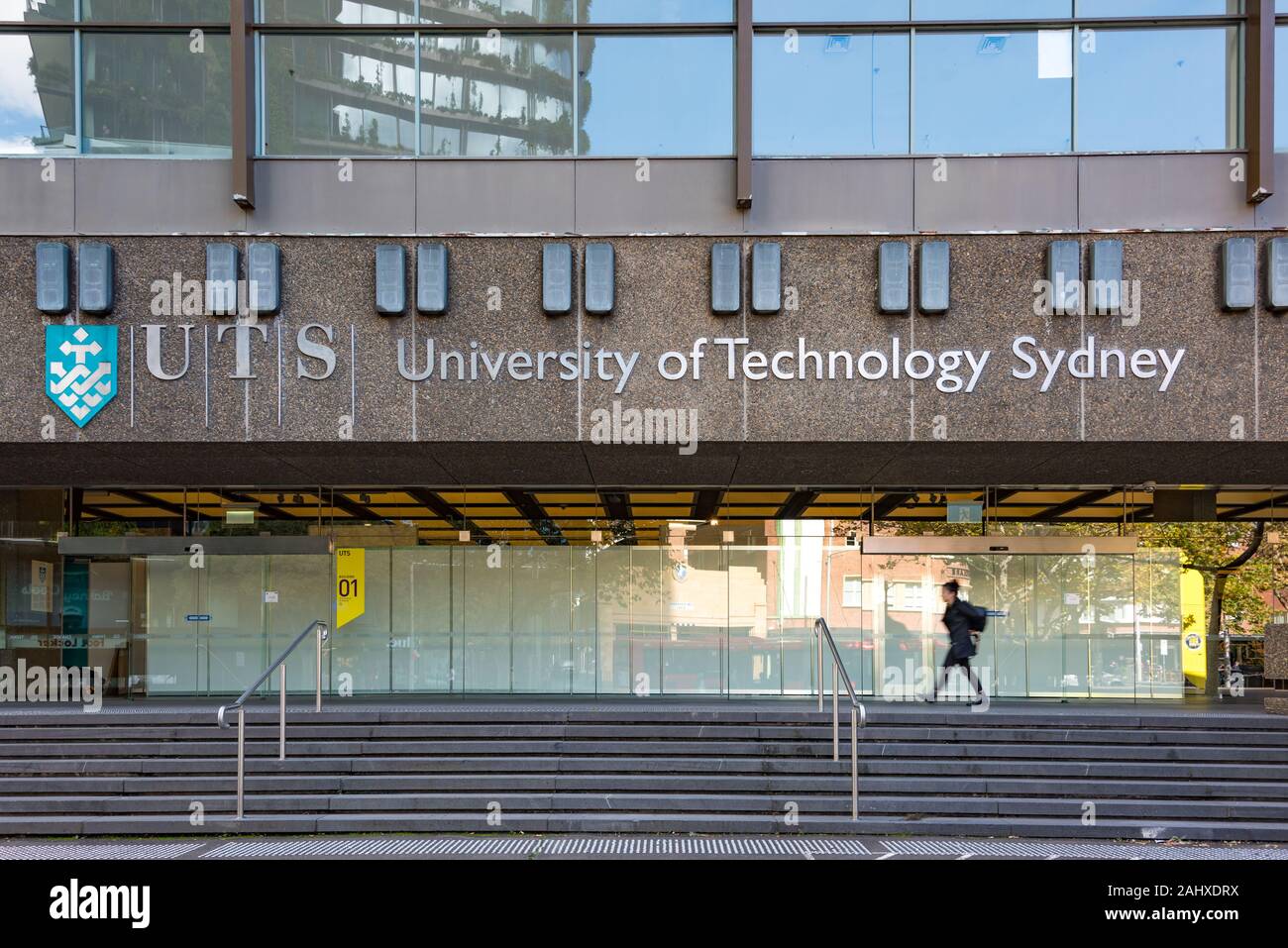 Sydney, Australia - April 25, 2016: University of Technology Sydney building in Ultimo with person walking Stock Photo