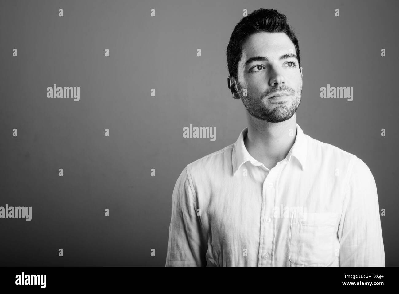 Portrait of young handsome businessman in black and white Stock Photo ...