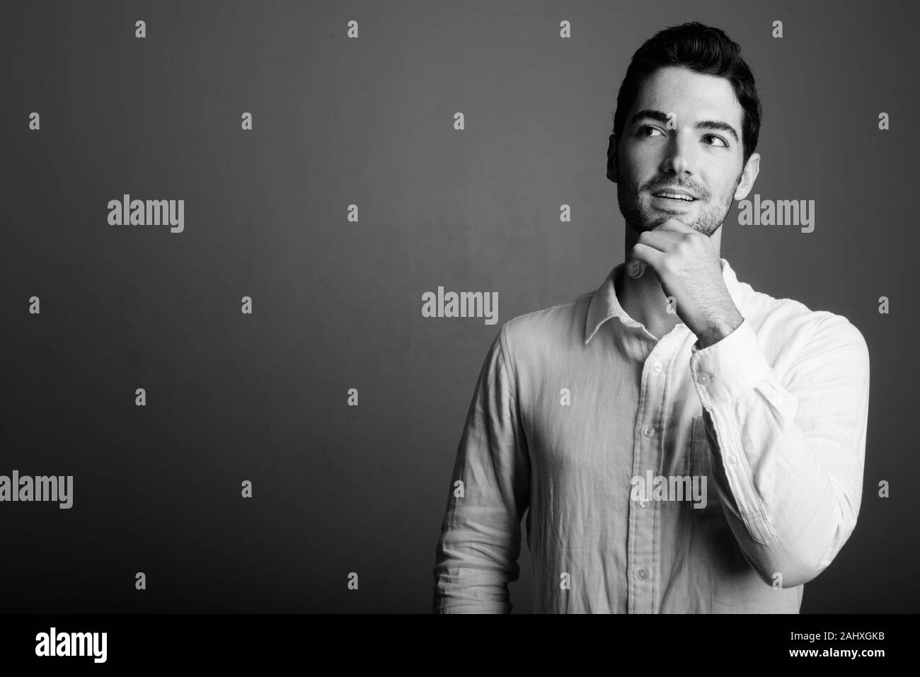 Portrait of young handsome businessman in black and white Stock Photo ...