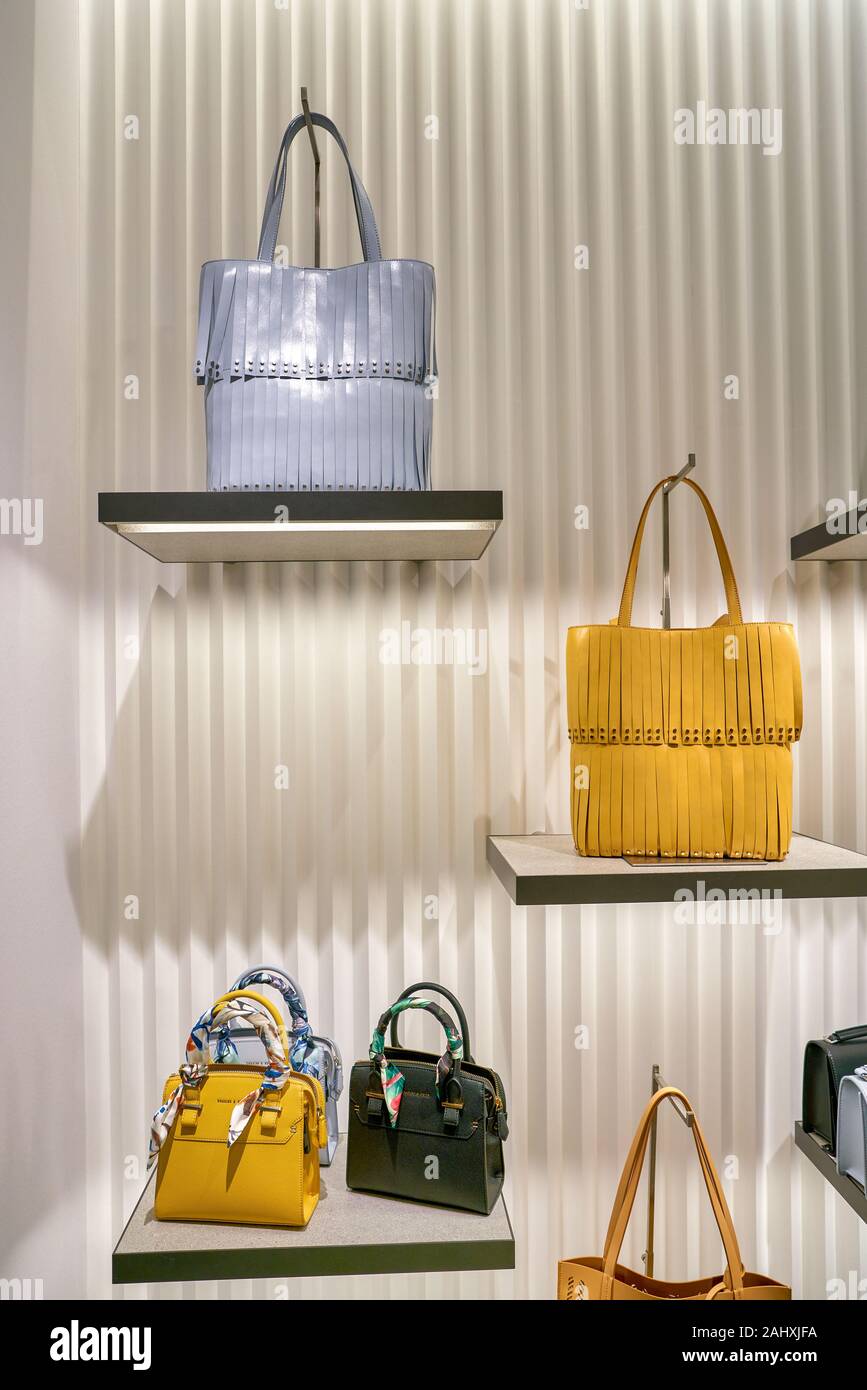 SINGAPORE - CIRCA APRIL, 2019: bags on display at Charles & Keith store in  The Shoppes at Marina Bay Sands. CHARLES & KEITH is a Singaporean fast-fash  Stock Photo - Alamy