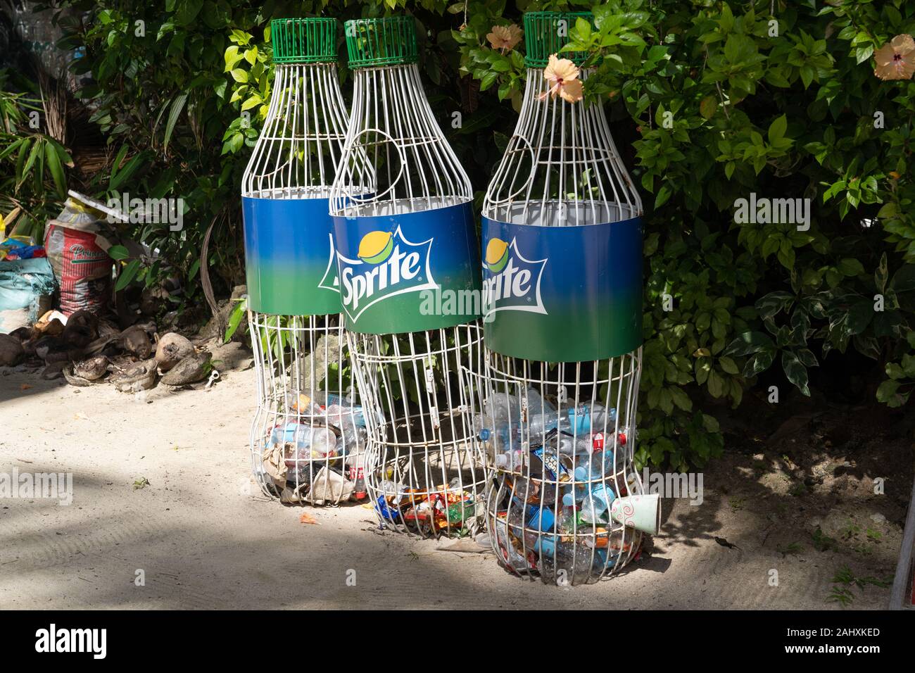 Trash containers for the collection & recycling of empty plastic bottles,located at Cloud 9 surfing area,Siargao Island,Philippines.The initiative on Stock Photo