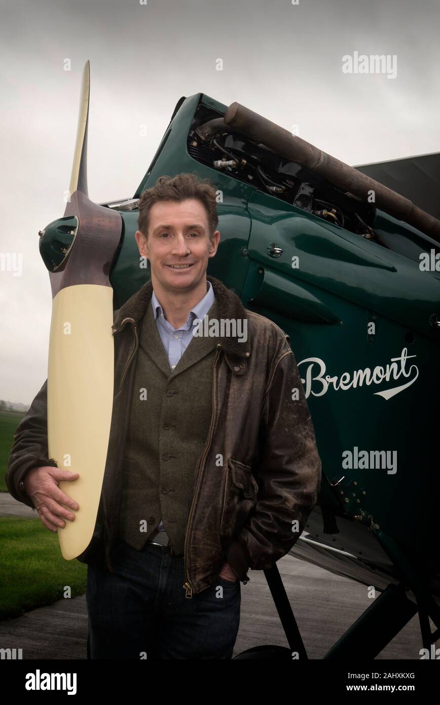 Nick English of Bremont watches with his Tiger Moth vintage aeroplane Stock Photo