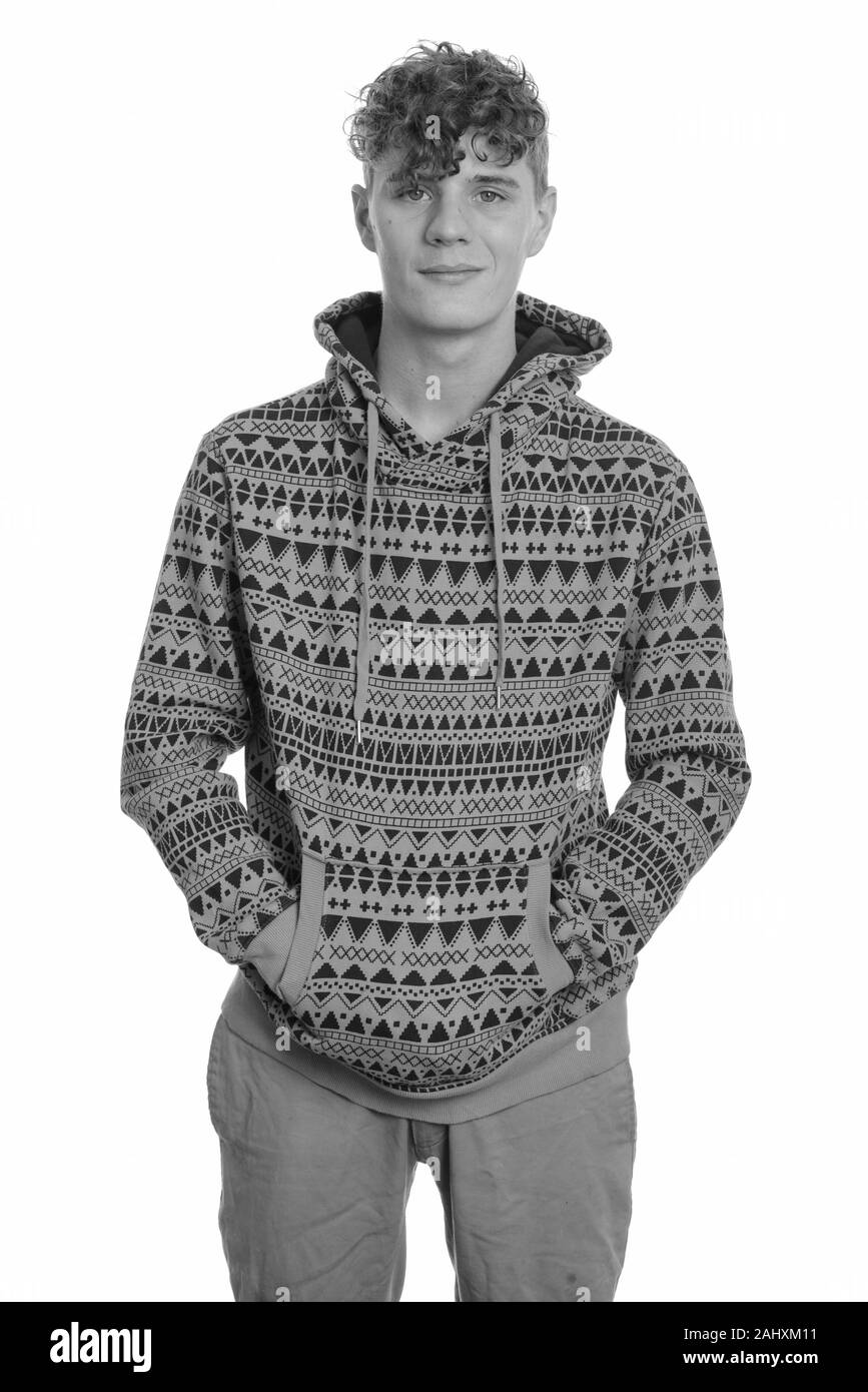 Portrait of young handsome man with curly hair Stock Photo - Alamy