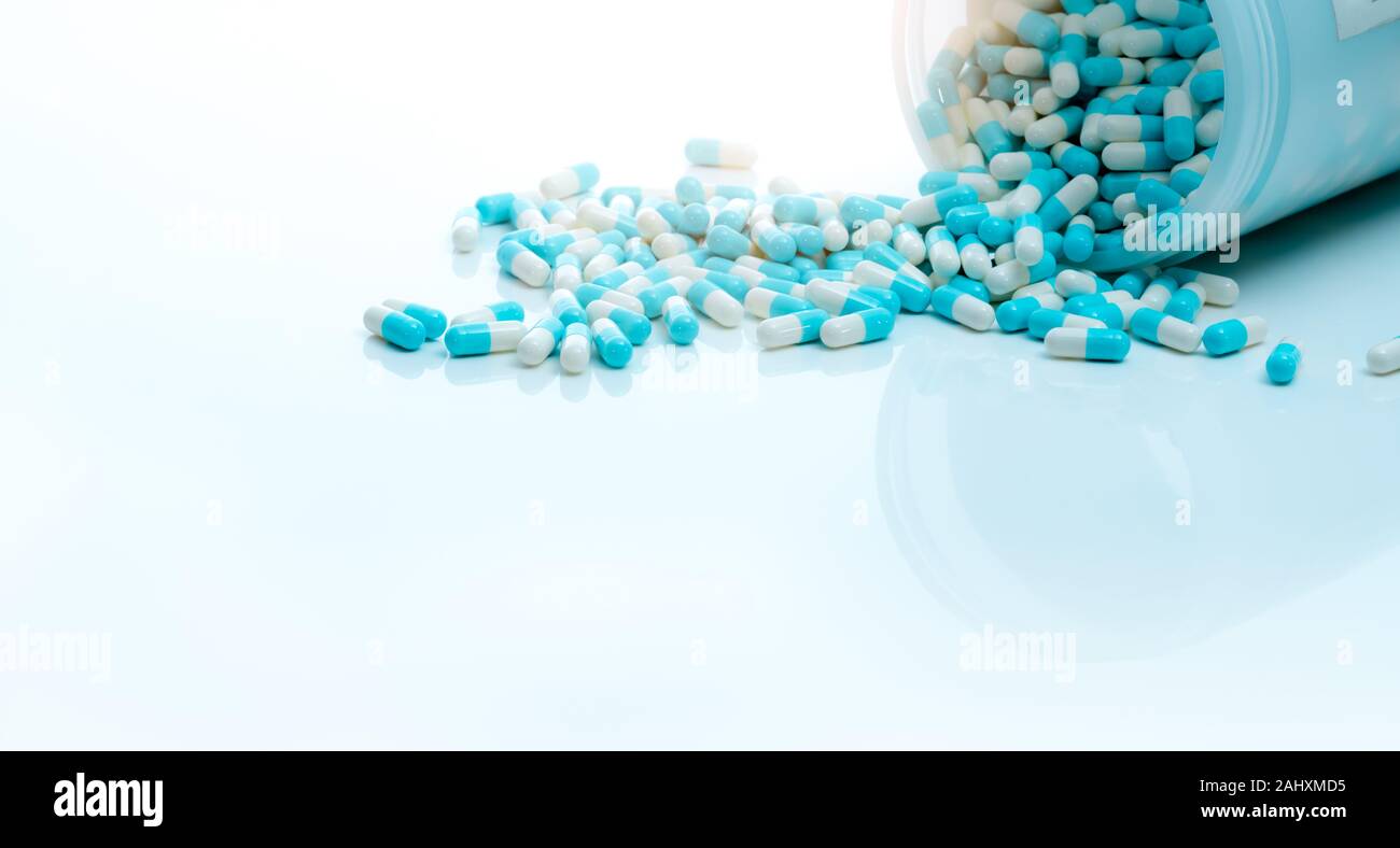 Bluewhite antibiotic capsule pill and capsule pills bottle. Antibiotic