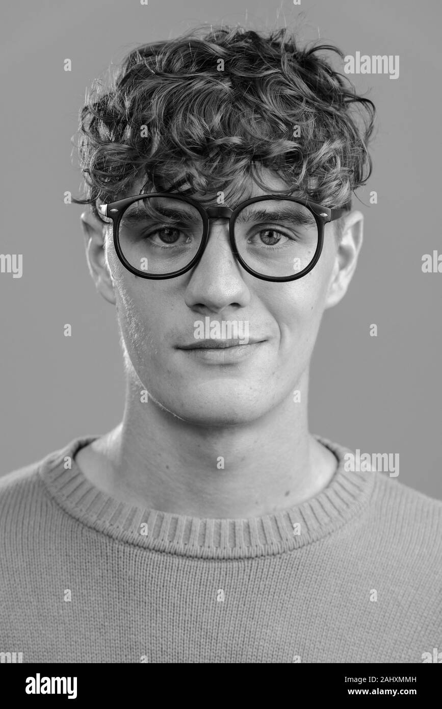 face of young handsome nerd man with curly hair wearing eyeglasses stock photo alamy mix girl hairstyles grown ups