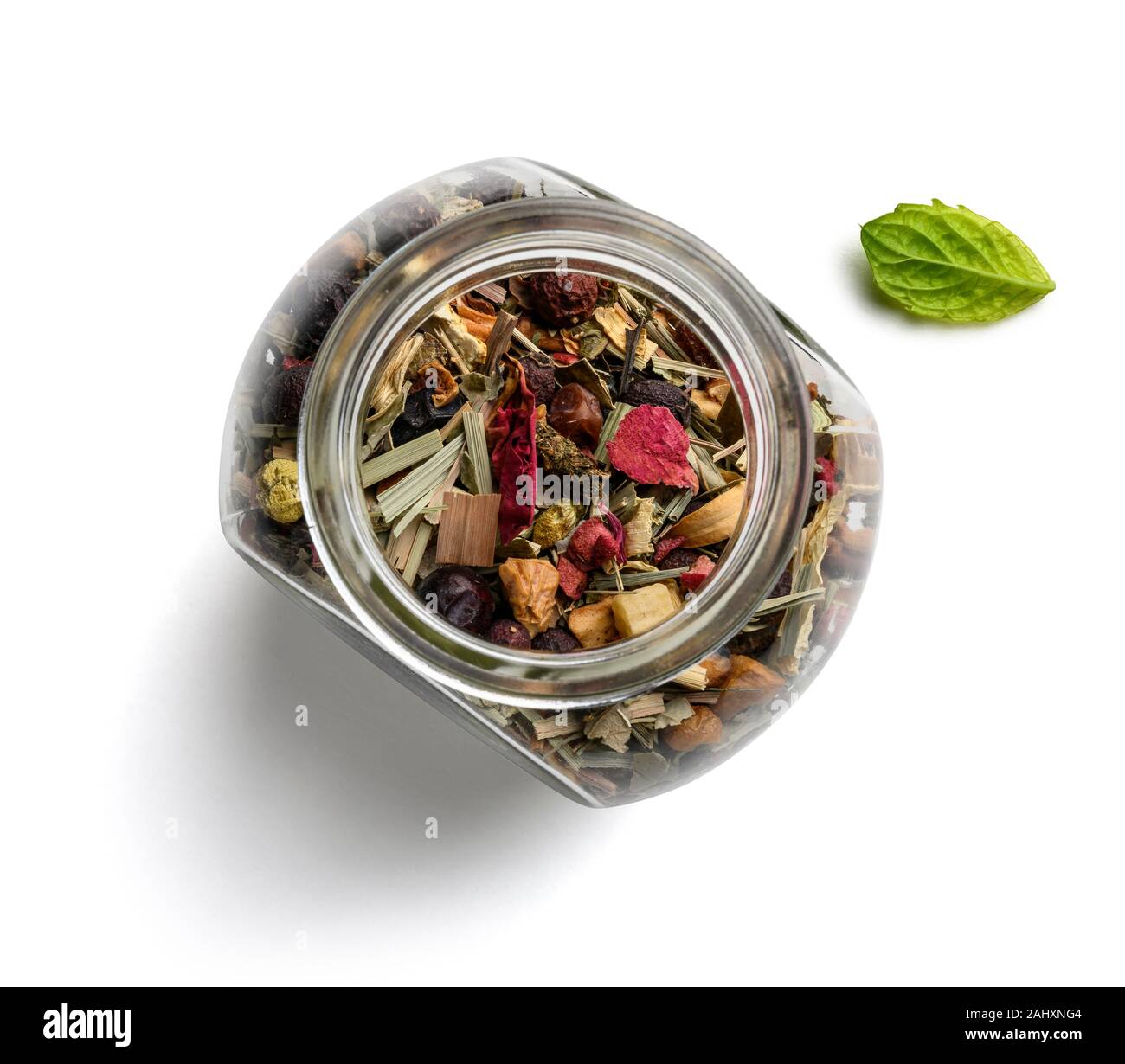 Green tea with natural aromatic additives. Top view on white background ...