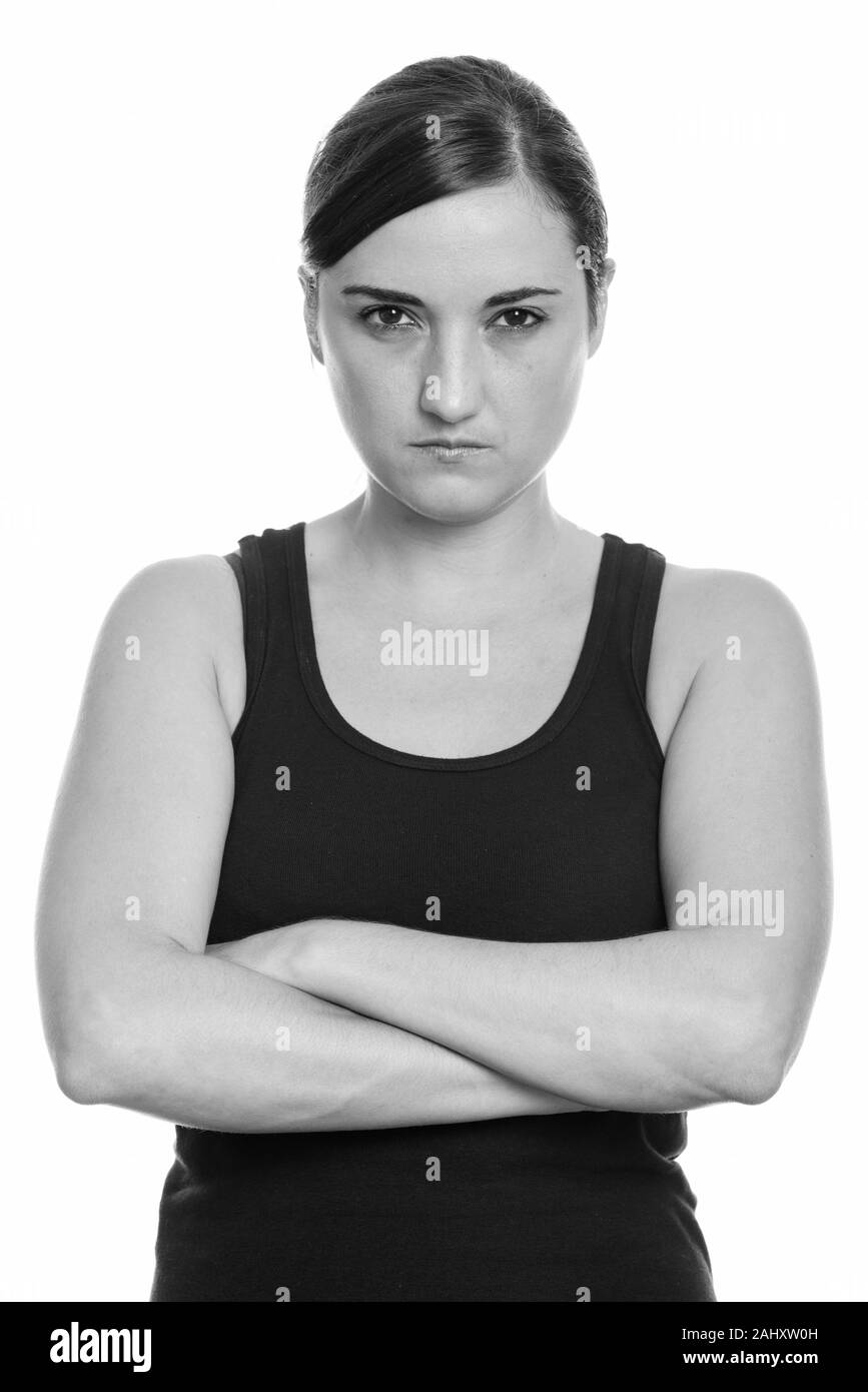 Close up of beautiful woman looking angry with arms crossed Stock Photo