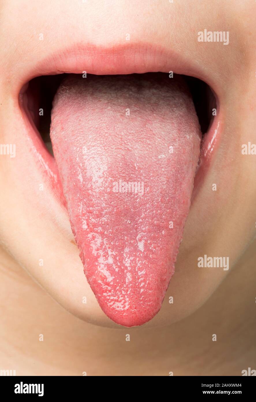 Human tongue protruding out. Child tongue Stock Photo Alamy