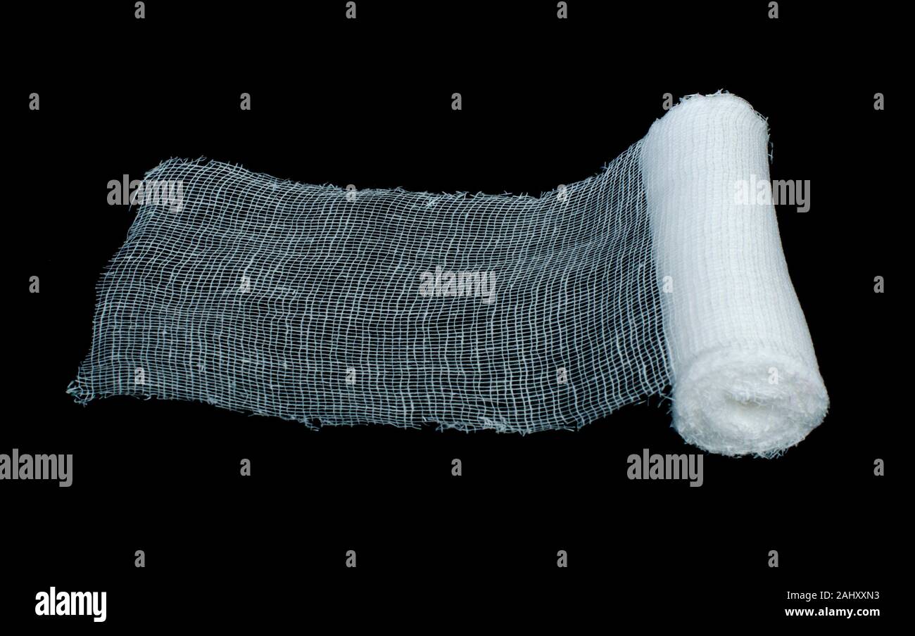 White roll bandage on black background. Stock Photo